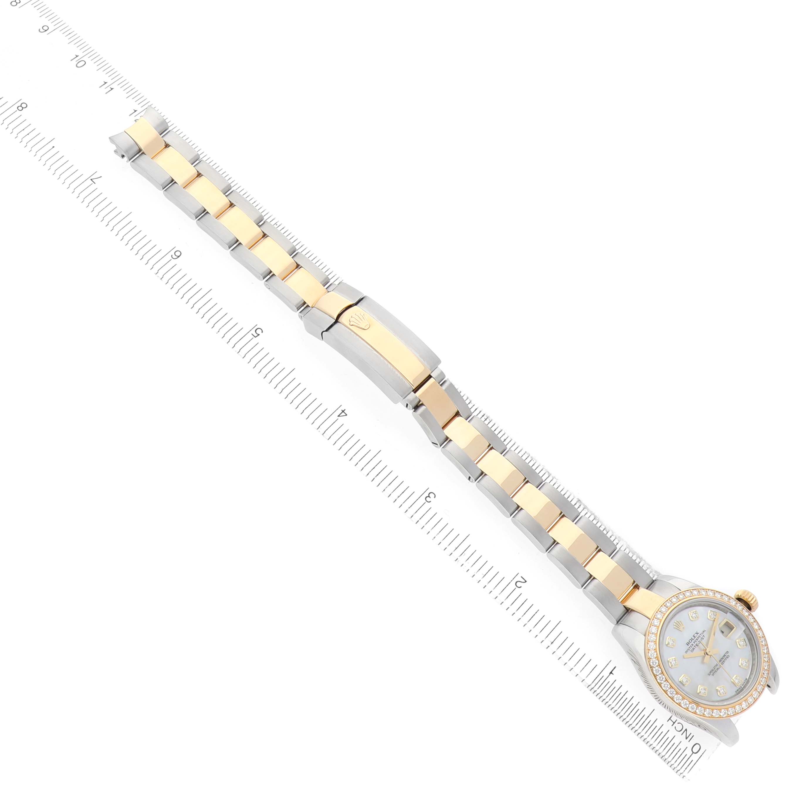 The Rolex Datejust 179383 Women's Steel and Gold (two tone) Mother of Pearl Dial watch is shown flat from the front, displaying the full bracelet and a partial view of the dial and clasp.