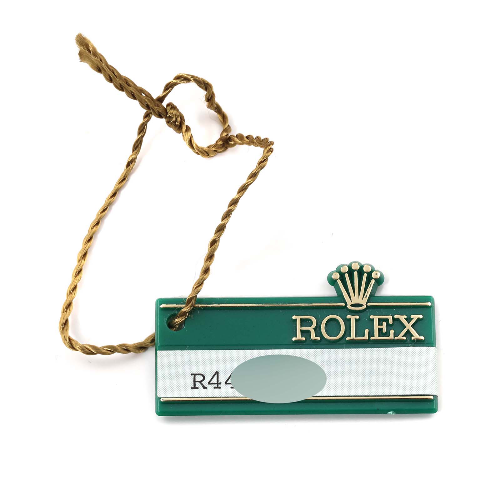 The image shows a green and white Rolex tag with a gold logo and text, presumably for the Datejust model.