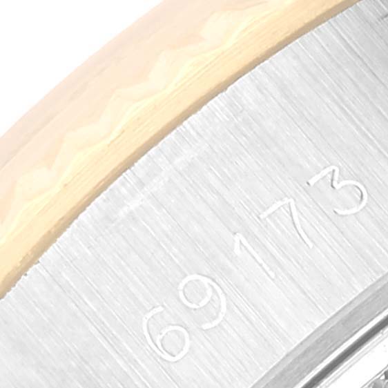 This close-up image shows the model number "69173" on the case of a Rolex Datejust 69173 Women's Steel and Gold (two tone) Silver Dial 69173 Women's Steel and Gold (two tone) Silver Dial watch.