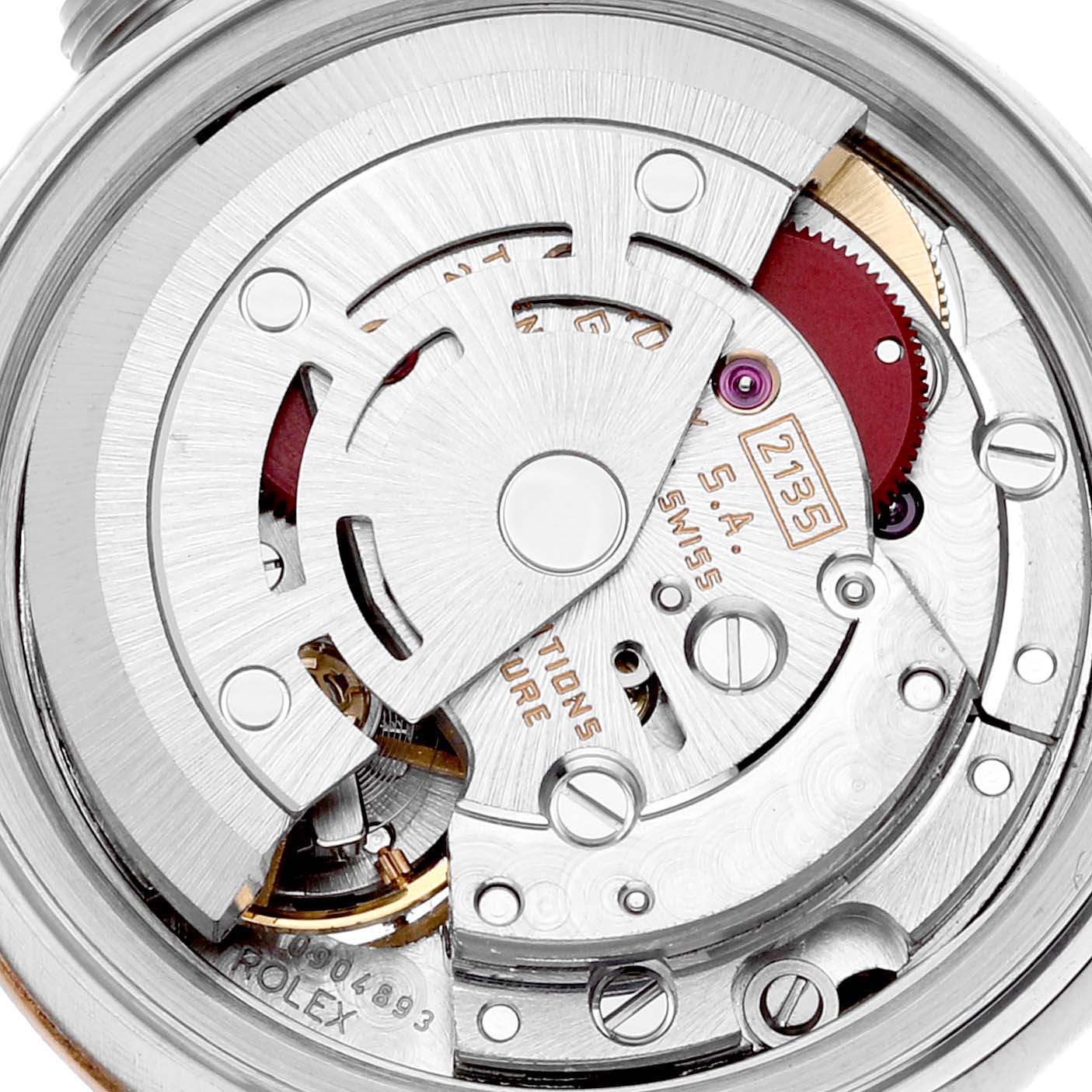 This is a close-up of the internal mechanism of a Rolex Datejust 69173 Women's Steel and Gold (two tone) Silver Dial 69173 Women's Steel and Gold (two tone) Silver Dial model, focusing on its intricate movement parts.