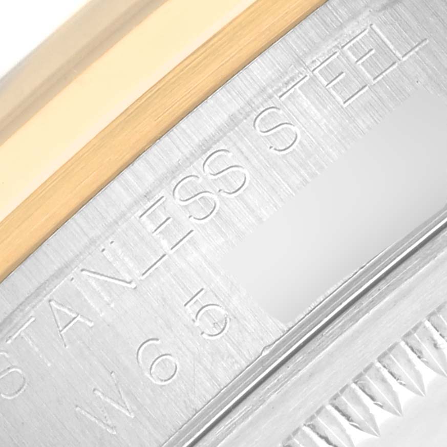 The image shows a close-up of the bezel and case side of a Rolex Datejust 16203 Men's Steel and Gold (two tone) Grey Dial 16203 Men's Steel and Gold (two tone) Grey Dial watch, highlighting the stainless steel and gold elements.