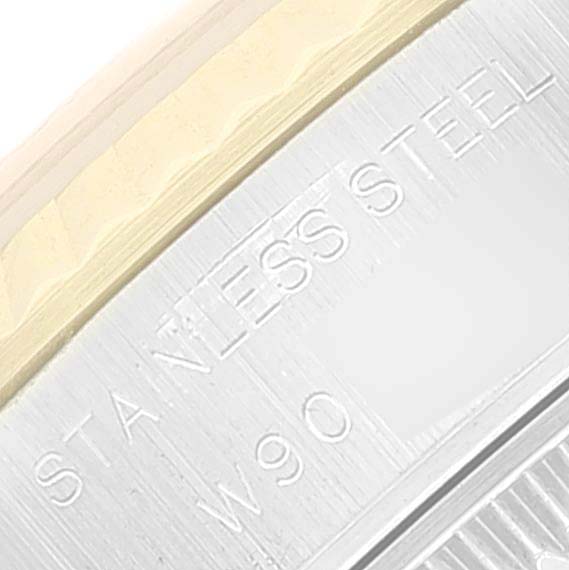 This close-up image shows the side engraving of a stainless steel Rolex Datejust 69173 Women's Steel and Gold (two tone) Champagne Dial 69173 Women's Steel and Gold (two tone) Champagne Dial watch case.