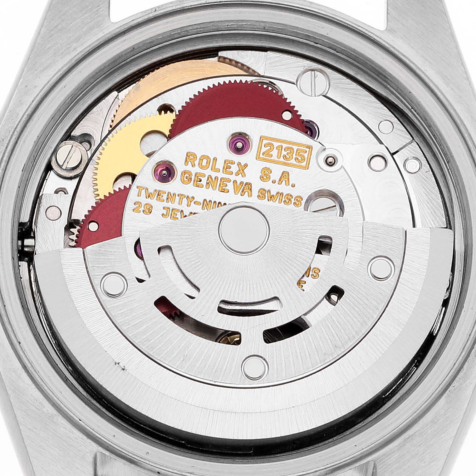 This is the internal movement of a Rolex Datejust 69173 Women's Steel and Gold (two tone) White Dial 69173 Women's Steel and Gold (two tone) White Dial watch, shown from the back, highlighting the gears and rotor.