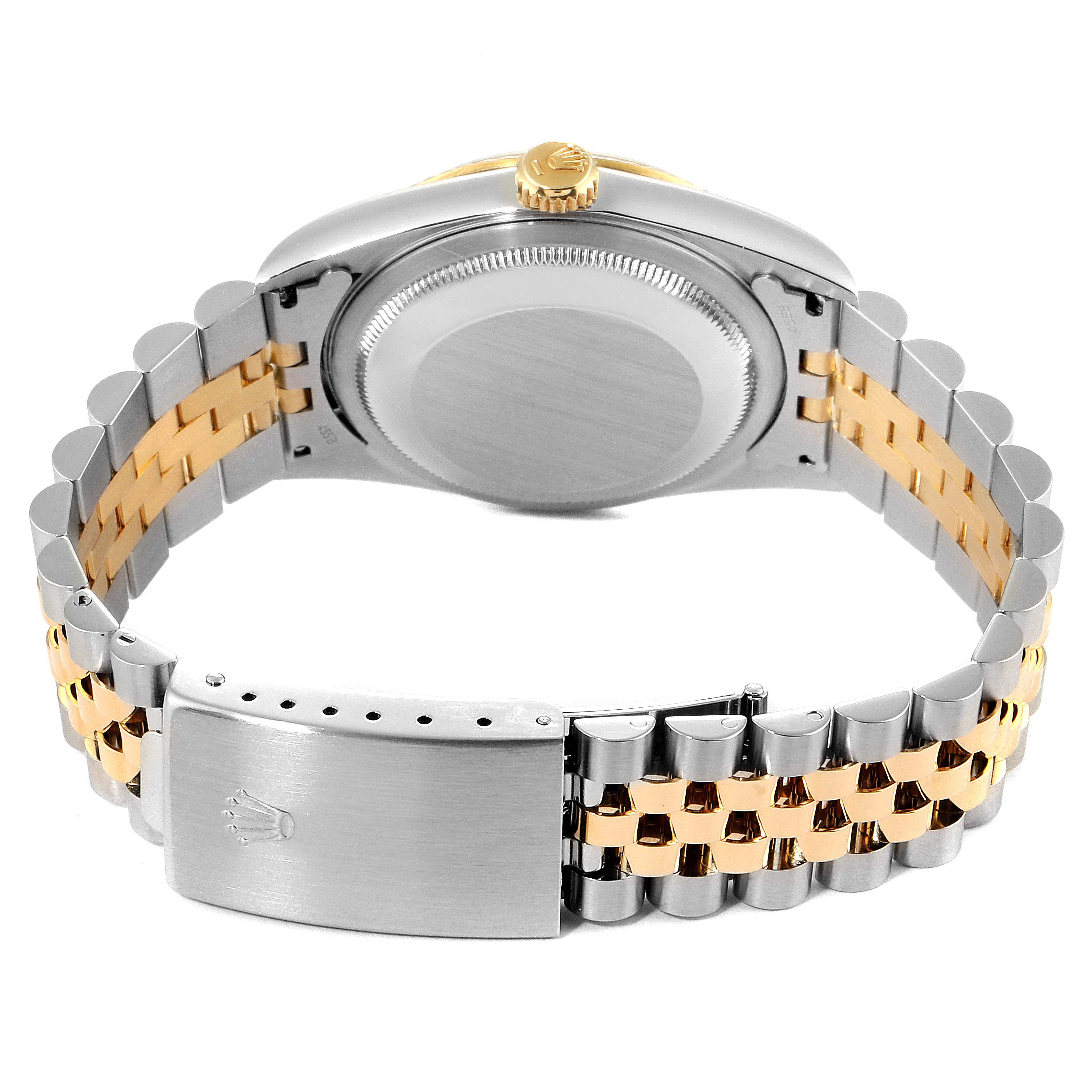 The image shows the back of a Rolex Datejust 16233 Men's Steel and Gold (two tone) White Dial 16233 Men's Steel and Gold (two tone) White Dial watch, focusing on its case back and two-tone bracelet with a clasp.