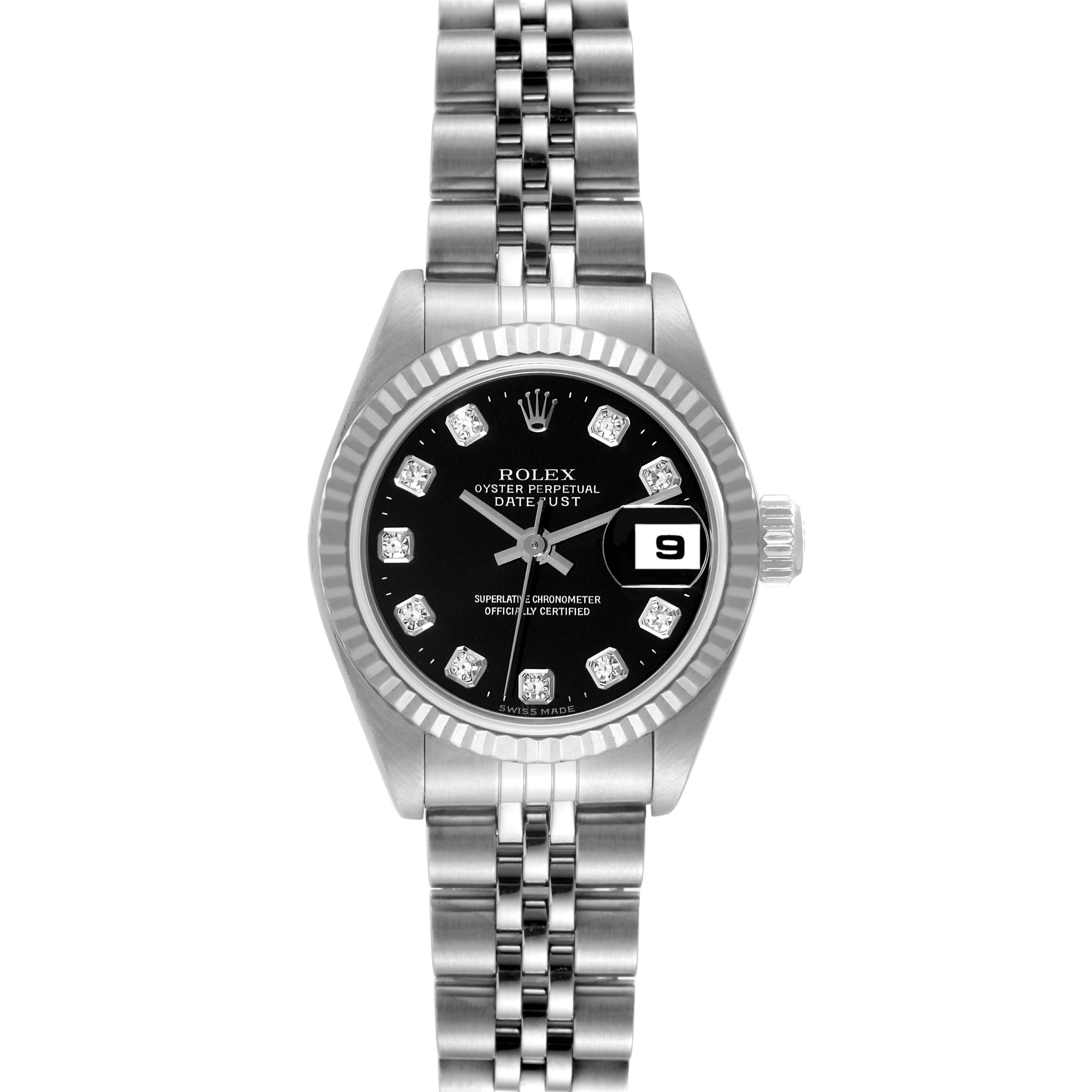 The image shows a frontal view of a Rolex Datejust 79174 Women's Stainless Steel Black Dial 79174 Women's Stainless Steel Black Dial watch with a black dial, fluted bezel, and Jubilee bracelet.