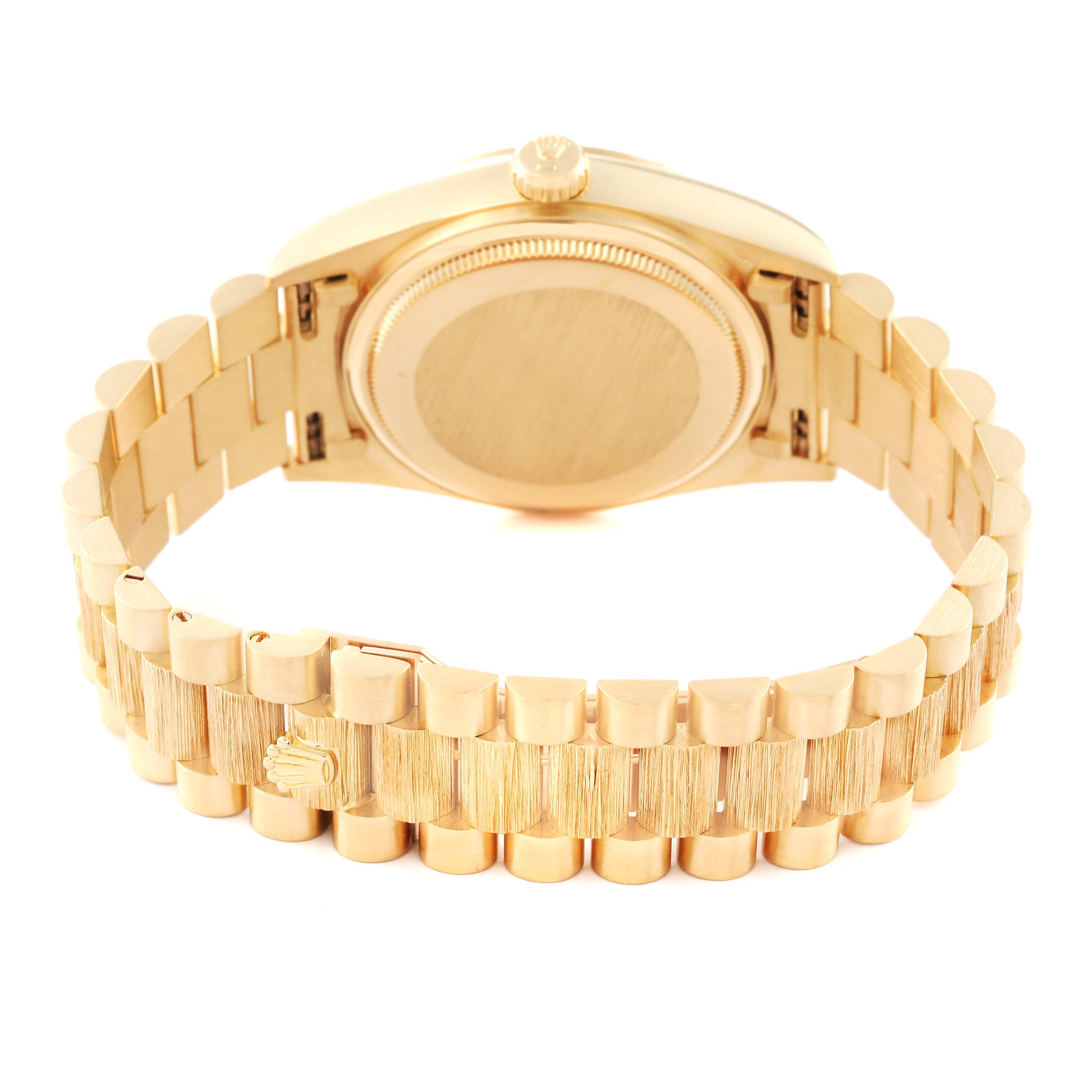 This image shows the back casing and bracelet of a Rolex President 18248 Men
s Yellow Gold Champagne Dial 18248 Men
s Yellow Gold Champagne Dial model watch.