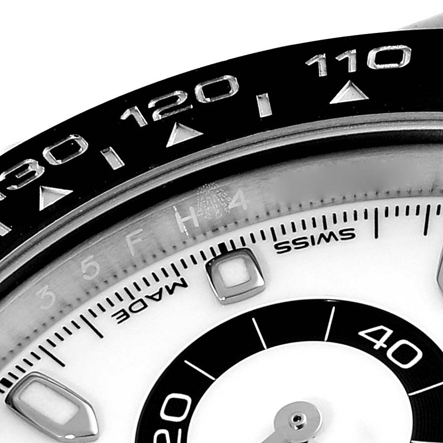 The image shows a close-up of the dial and tachymeter bezel of a Rolex Daytona 116500 Men's Stainless Steel White Dial 116500 Men's Stainless Steel White Dial watch.