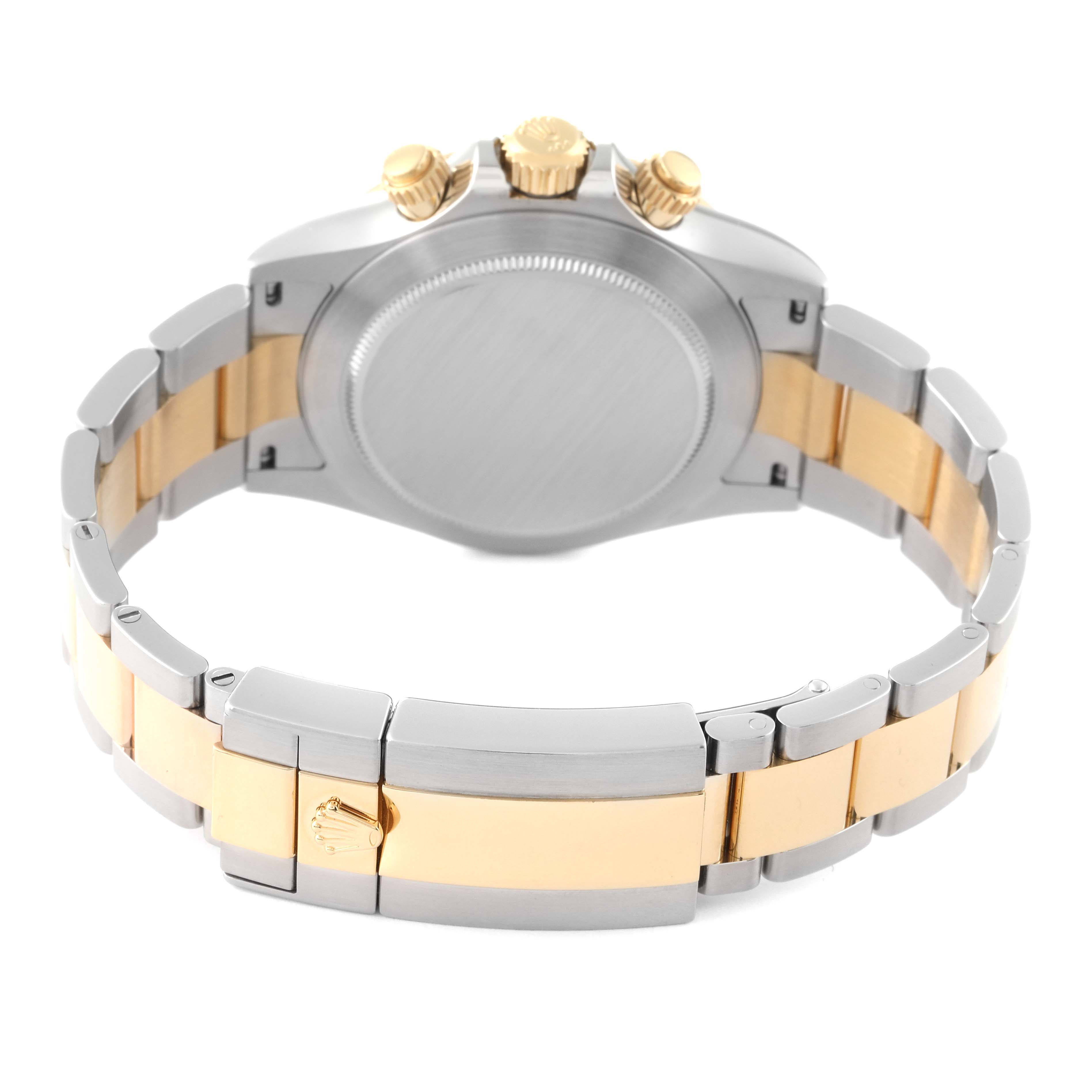 This image shows the back and bracelet clasp of a Rolex Daytona 116503 Men's Steel and Gold (two tone) Black Dial 116503 Men's Steel and Gold (two tone) Black Dial watch, highlighting its two-tone metal finish.