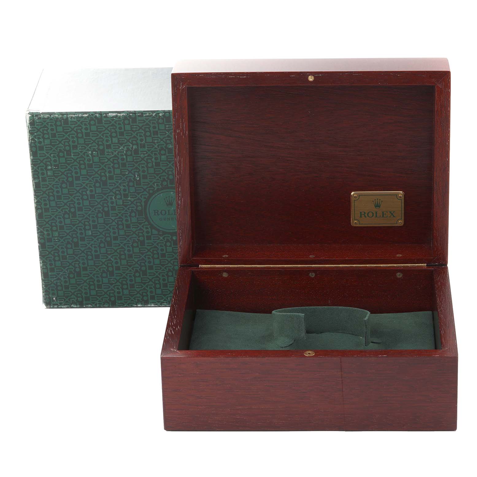 This image shows an open Rolex Daytona 16523 Men's Steel and Gold (two tone) Champagne Dial 16523 Men's Steel and Gold (two tone) Champagne Dial watch box and its outer packaging, revealing the interior cushion for displaying the watch.