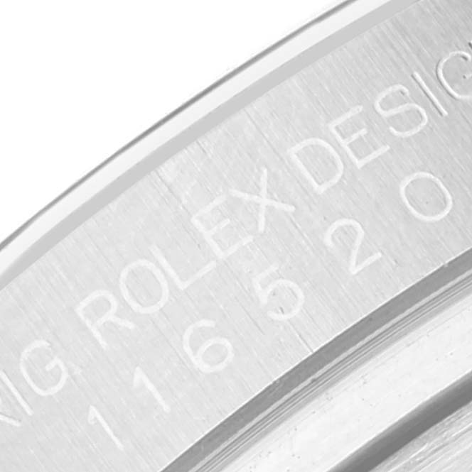 This close-up image shows the casing with the engravings "Rolex Design" and numbers of the Rolex Daytona 116520 Men's Stainless Steel White Dial 116520 Men's Stainless Steel White Dial watch.