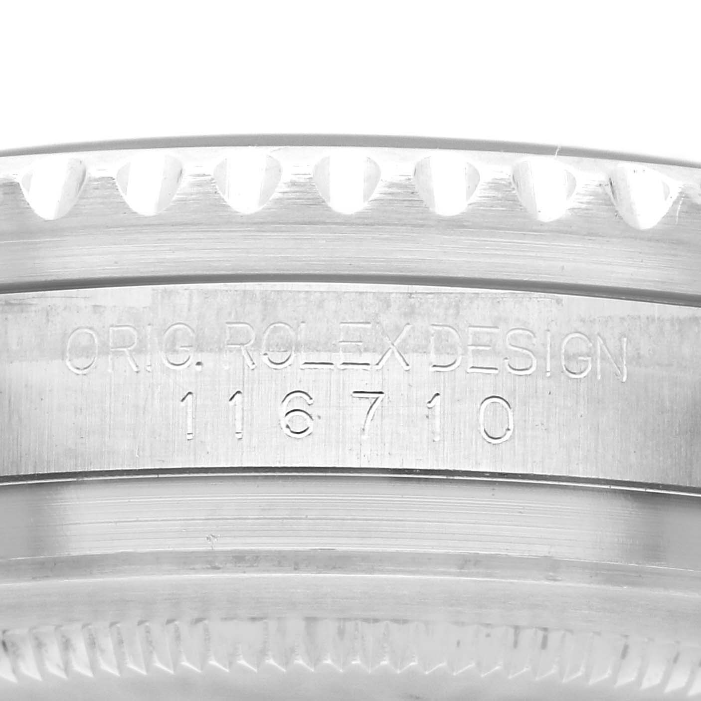 This image shows a close-up of the side engraving on a Rolex GMT-Master 116710 Men
s Stainless Steel Black Dial 116710 Men
s Stainless Steel Black Dial watch case, displaying the model number.