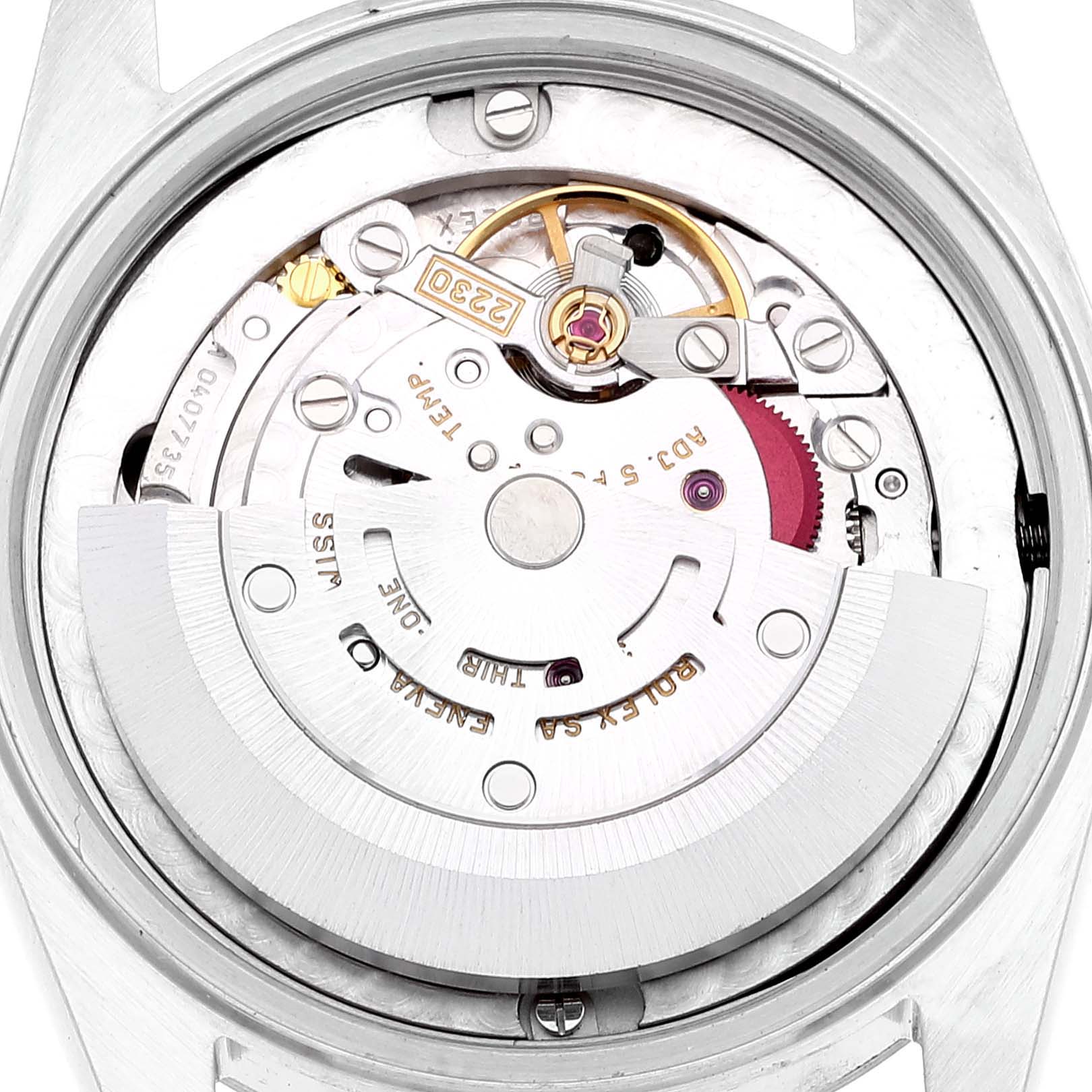 This image shows the internal mechanism of a Rolex Mid-Size 77080 Women's Stainless Steel Black Dial 77080 Women's Stainless Steel Black Dial model watch from a top-down angle, highlighting its intricate movement parts.