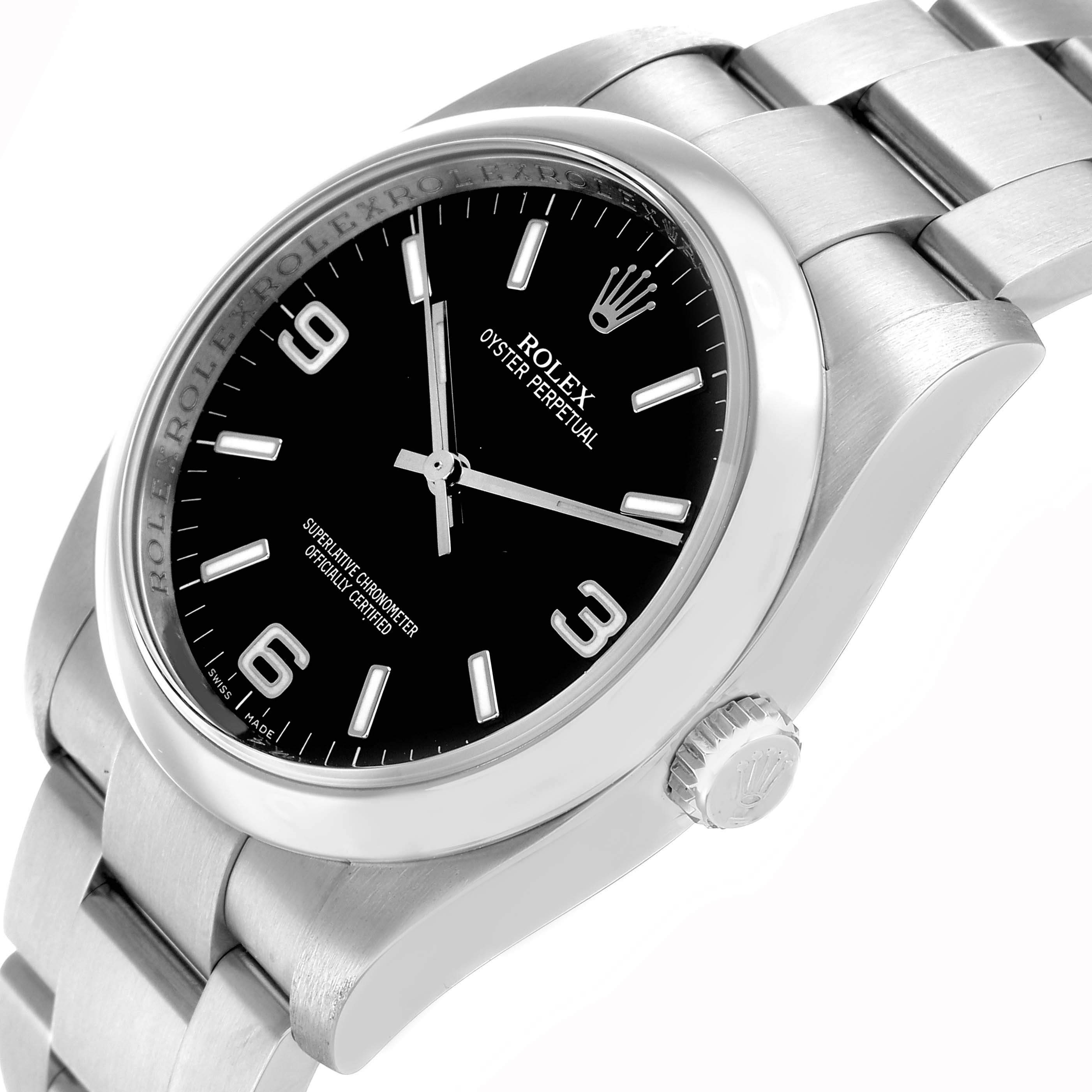 The Rolex Oyster Perpetual 116000 Men's Stainless Steel Black Dial watch is shown at a tilted angle, highlighting the black dial, hands, crown, and part of the bracelet.
