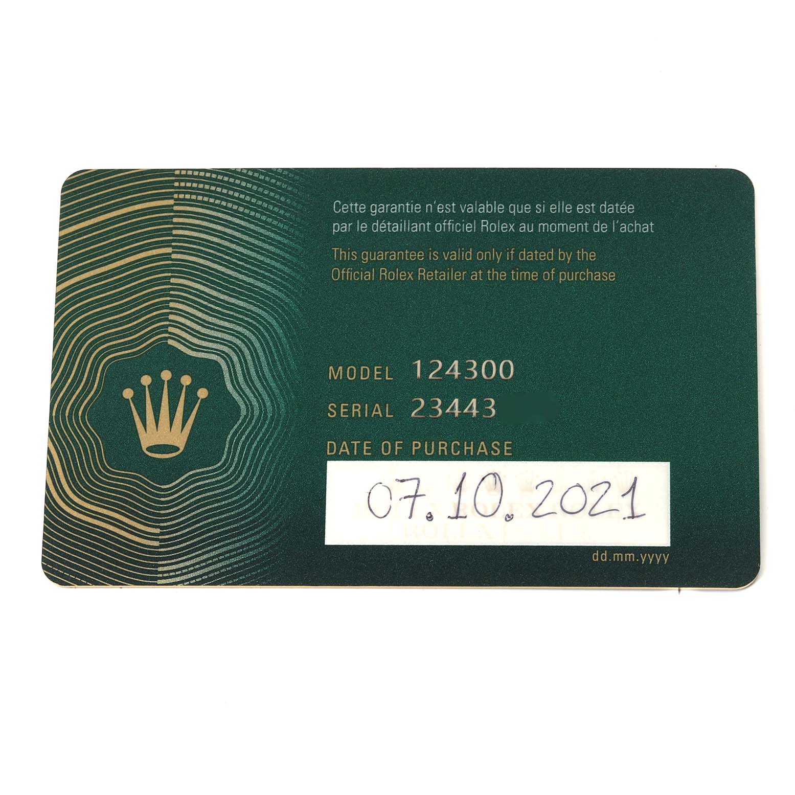 This is a close-up of the warranty card for the Rolex Oyster Perpetual 124300 Men
s Stainless Steel Yellow Dial 124300 Men
s Stainless Steel Yellow Dial model 124300.