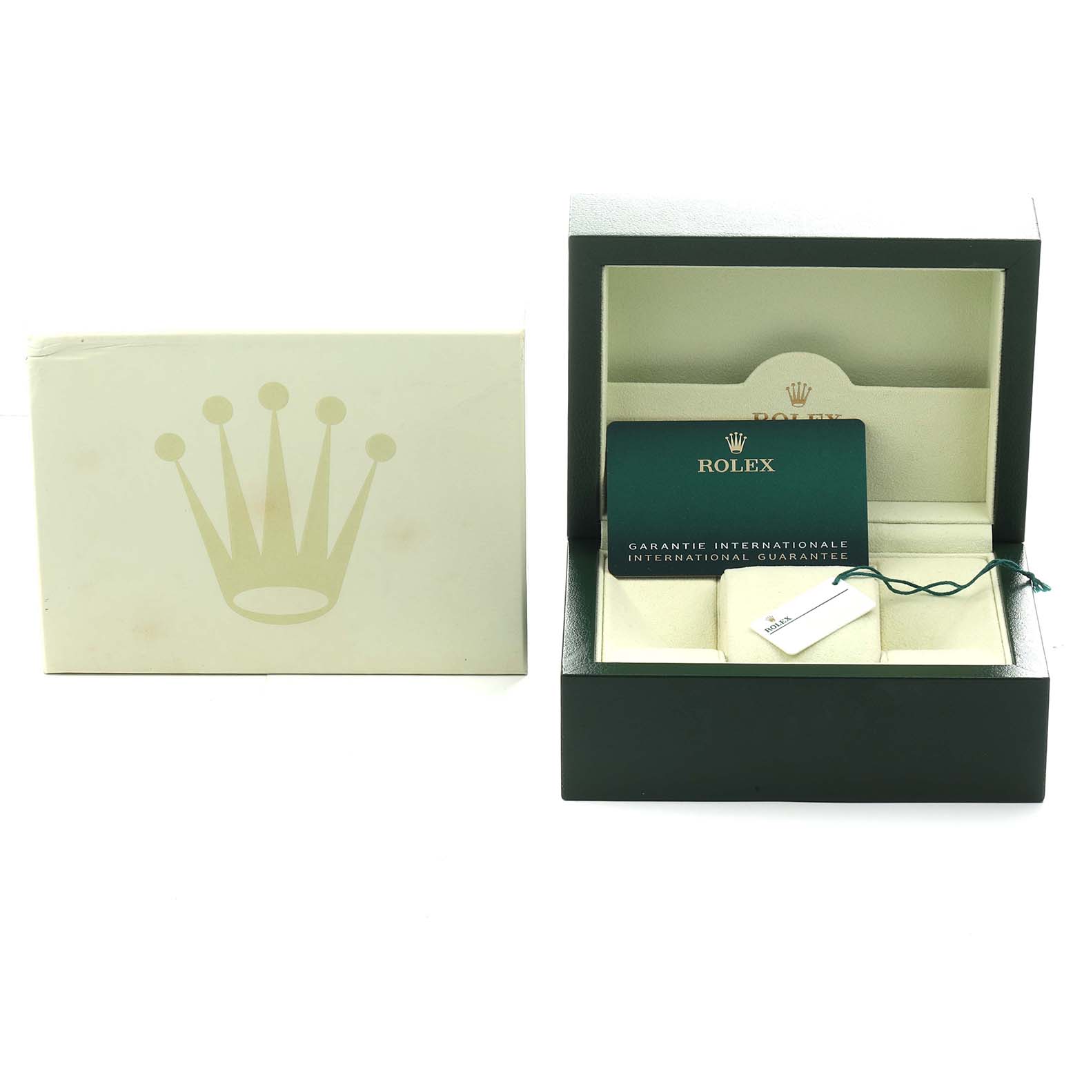 The image shows the packaging for a Rolex Oyster Perpetual 276200 Women's Stainless Steel Black Dial, including the box, guarantee card, and tag.