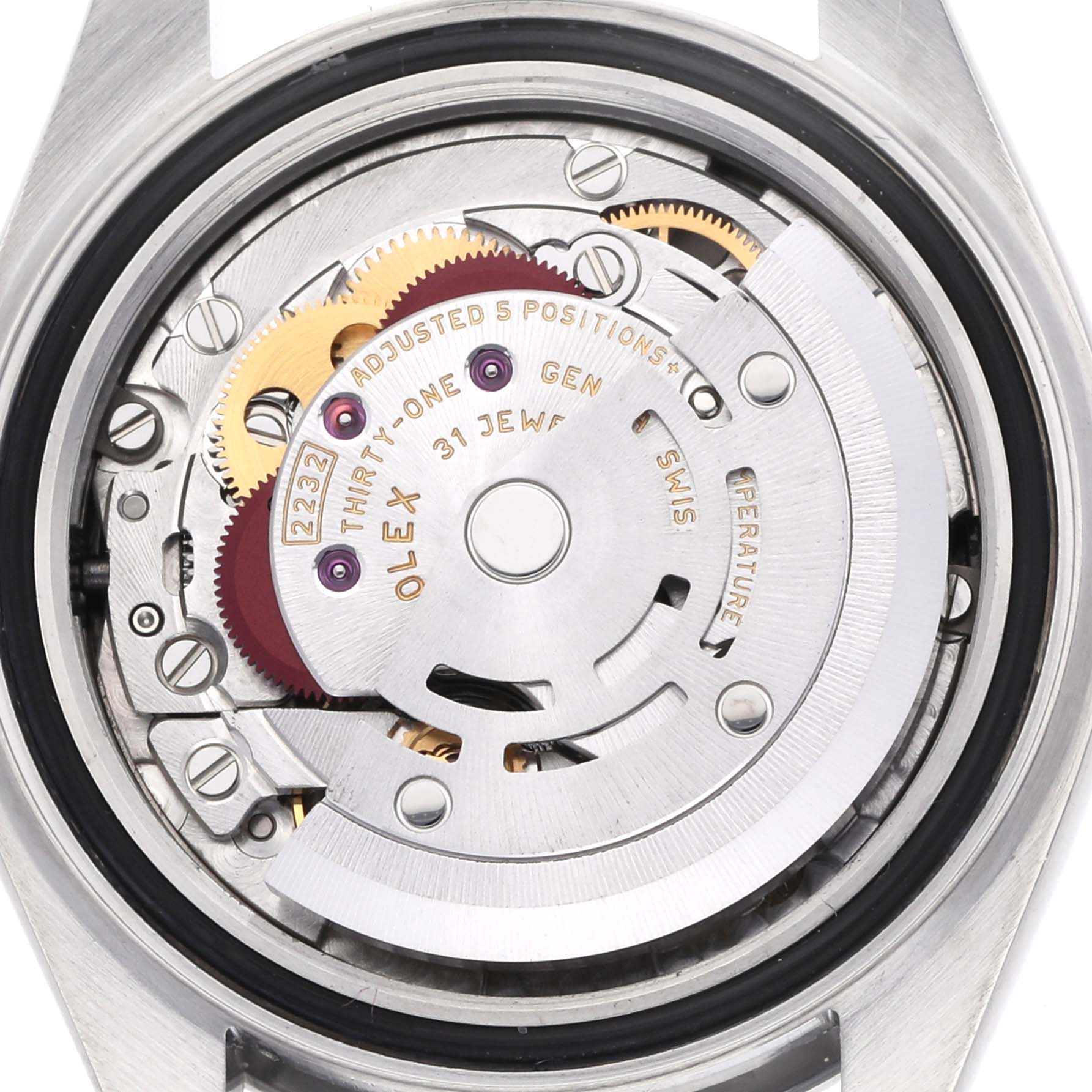 The image shows the back view of a Rolex Oyster Perpetual 276200 Women's Stainless Steel Black Dial watch, revealing its intricate mechanical movement.