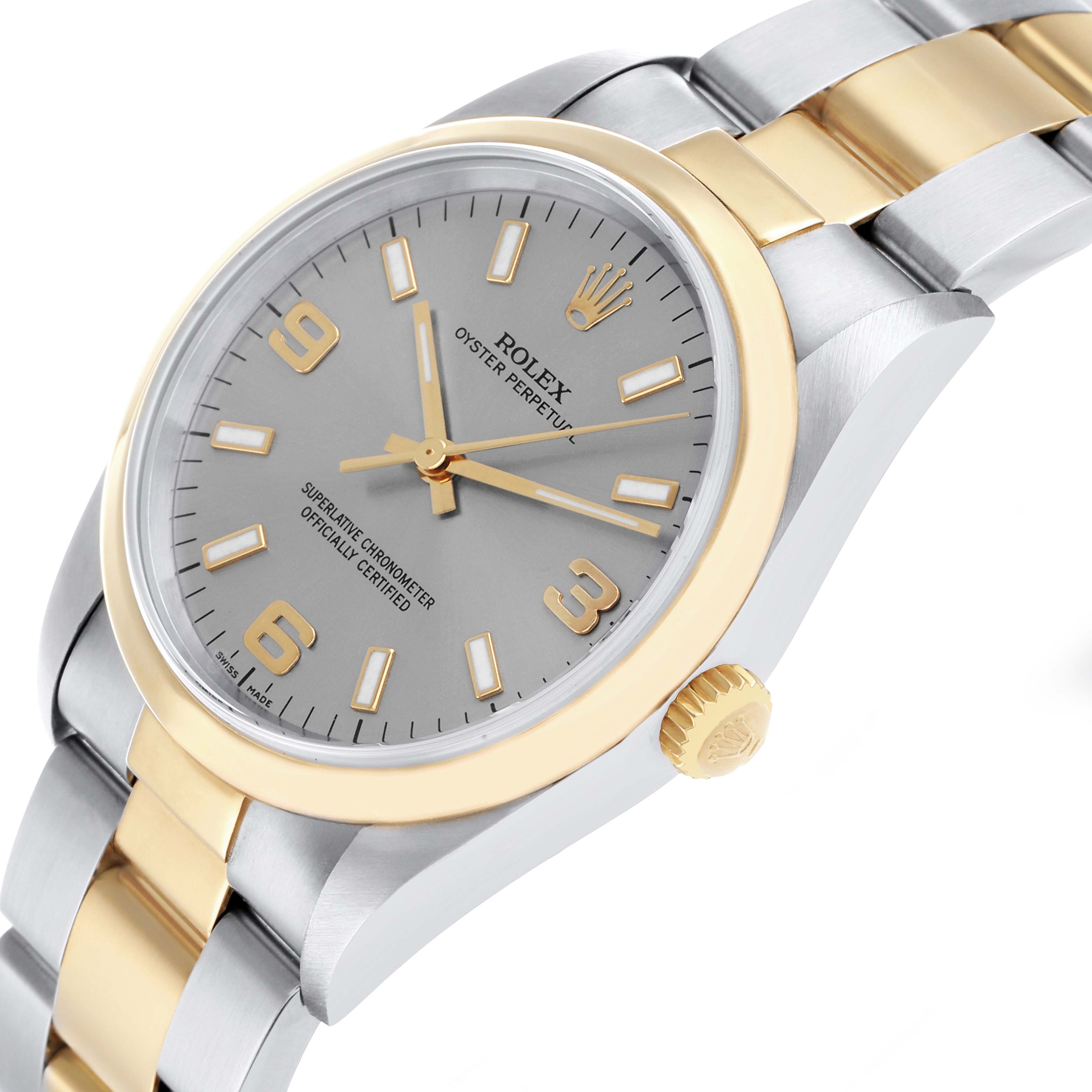 The Rolex Oyster Perpetual 14203 Men's Steel and Gold (two tone) Silver Dial watch is shown at a three-quarter angle, highlighting the dial, bezel, crown, and bracelet.