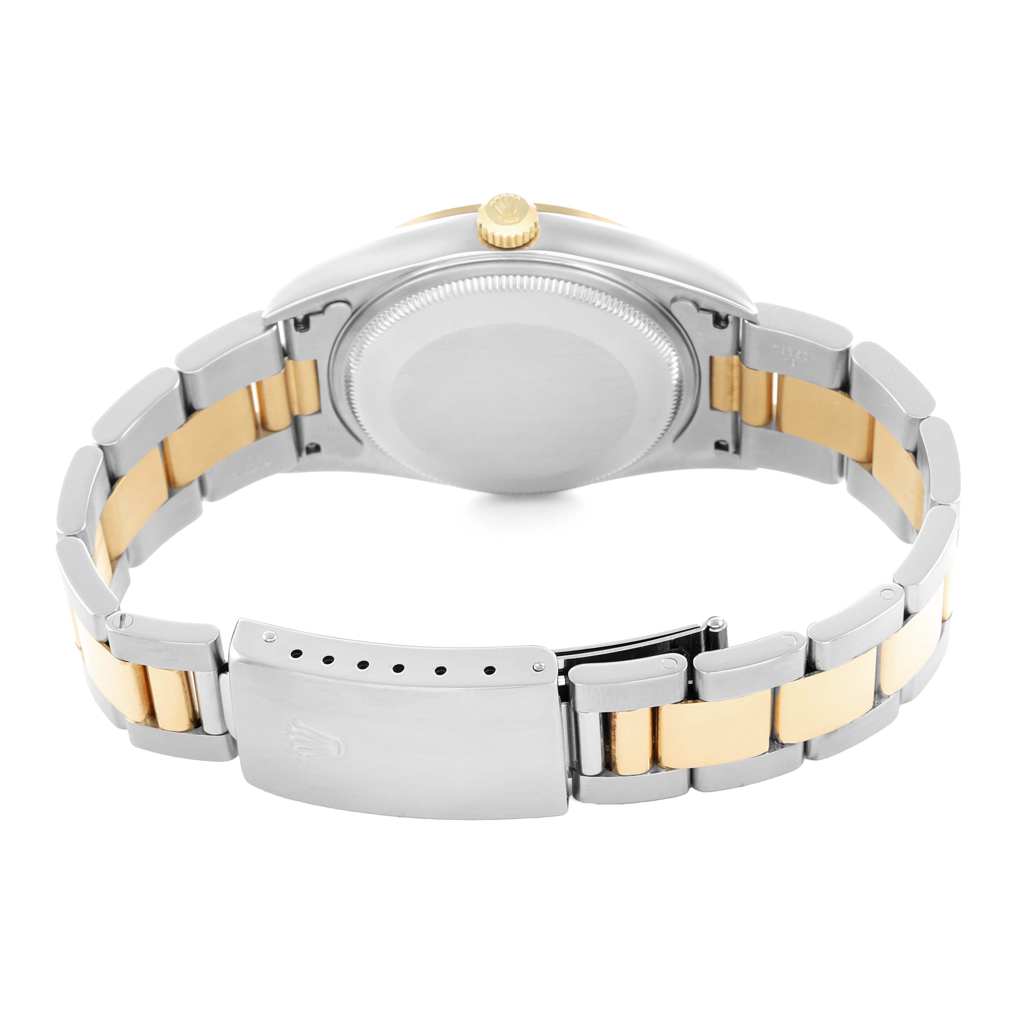 The Rolex Oyster Perpetual 14203 Men's Steel and Gold (two tone) Silver Dial watch is shown from the back, highlighting the case, bracelet, and clasp.