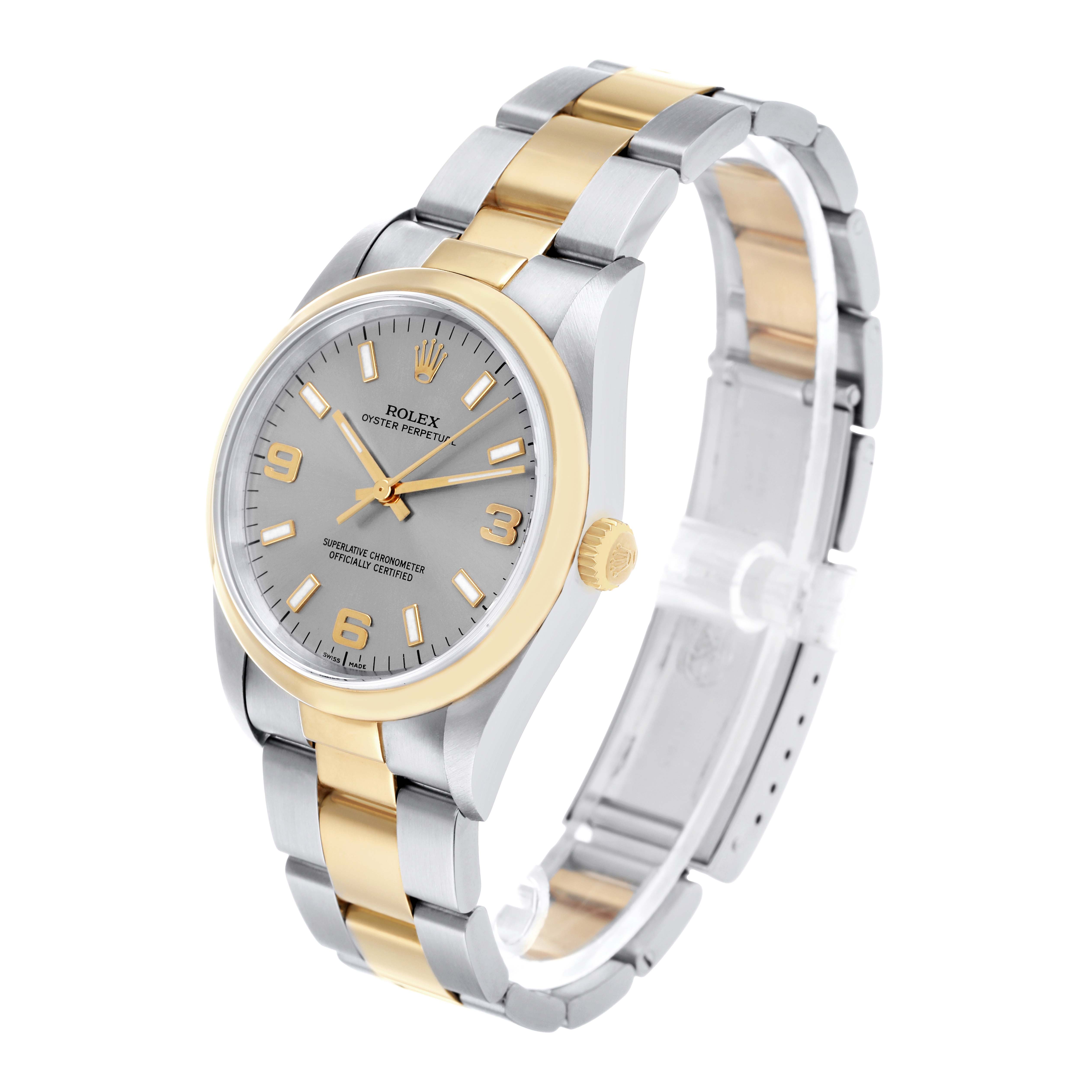 The Rolex Oyster Perpetual 14203 Men's Steel and Gold (two tone) Silver Dial watch is shown at a three-quarter angle, displaying the dial, bezel, crown, and bracelet.