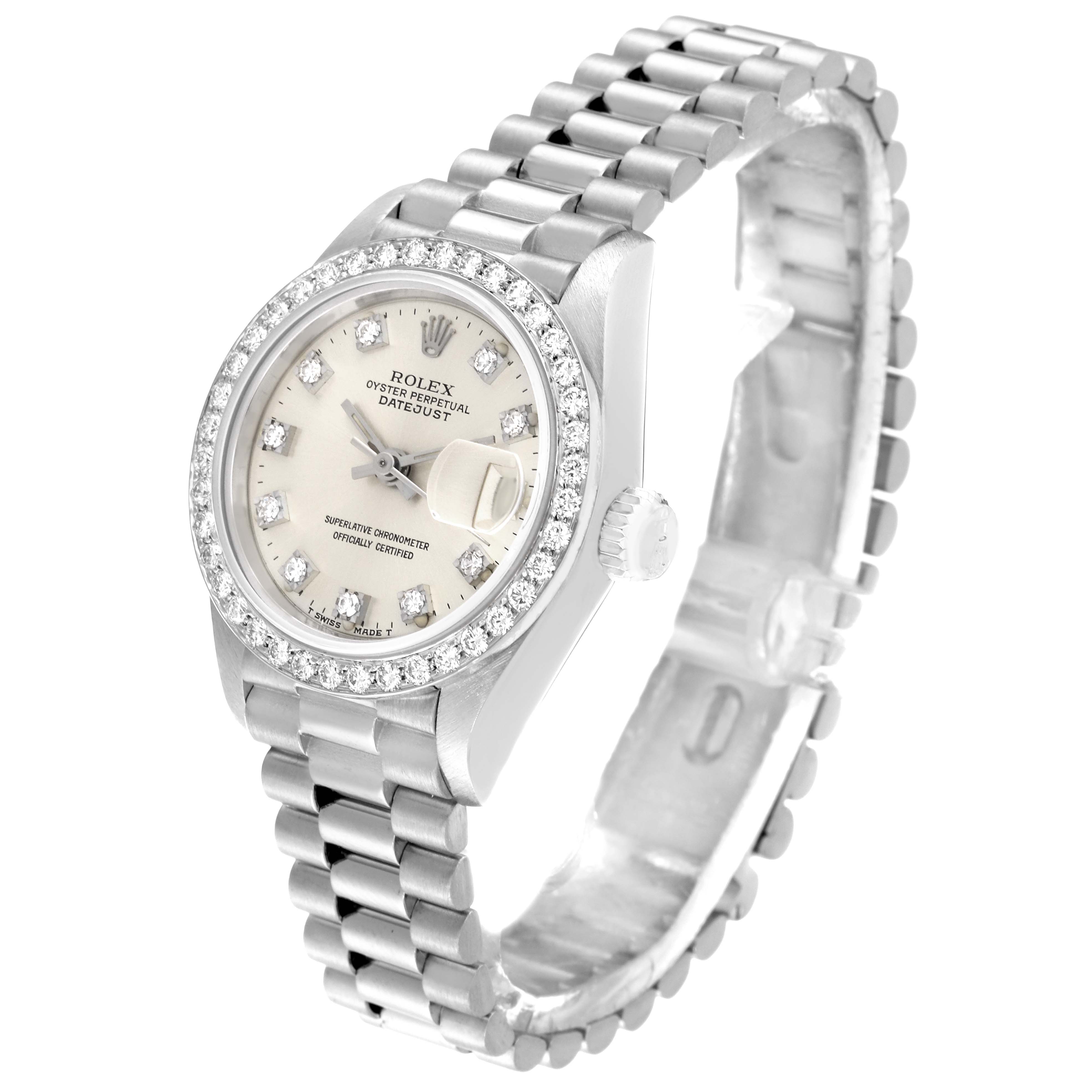 This image shows a Rolex President 69139 Women's White Gold Silver Dial 69139 Women's White Gold Silver Dial model watch from an angled top-down view, highlighting the face, bezel, and band.