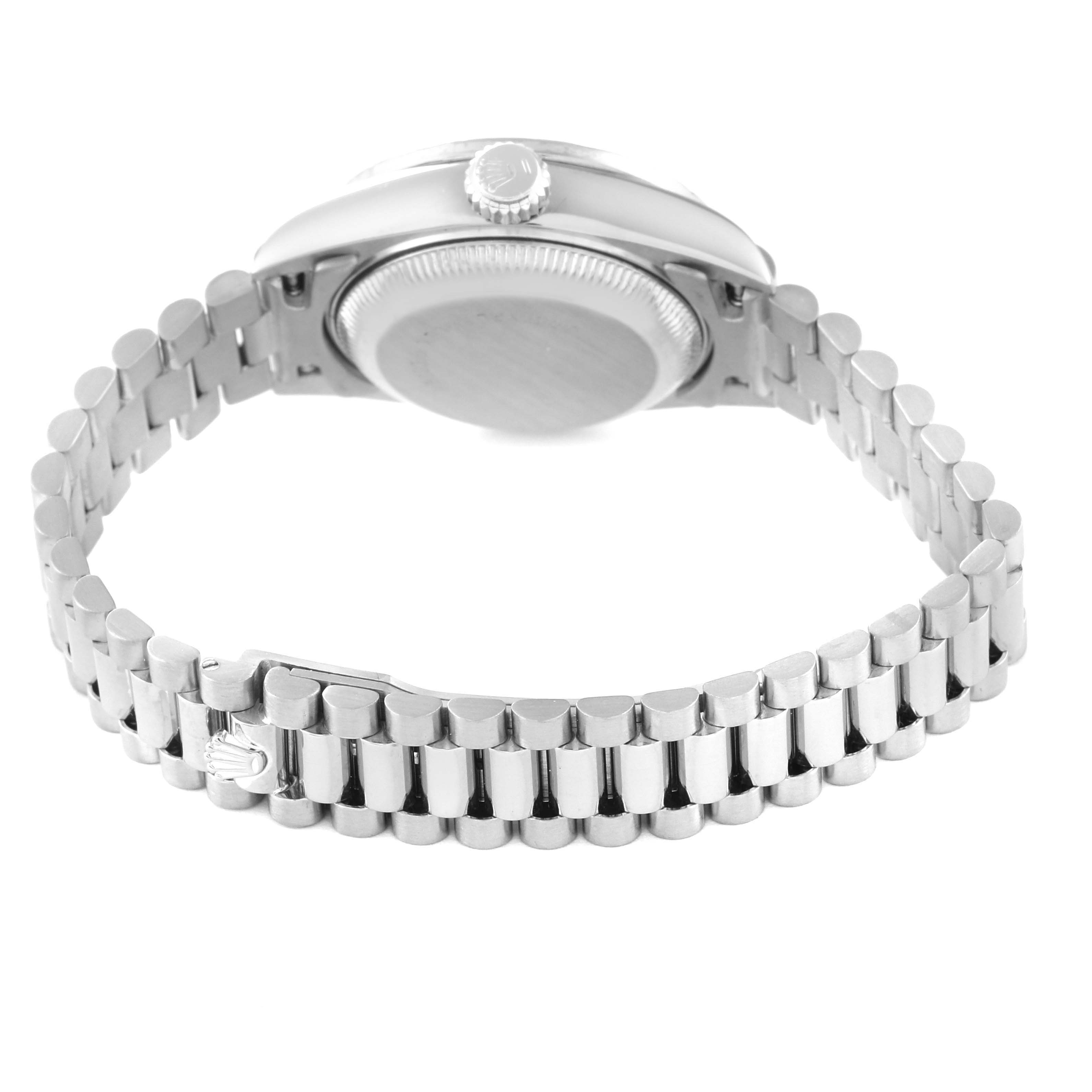 The image shows the backside and bracelet of a Rolex President 69139 Women's White Gold Silver Dial 69139 Women's White Gold Silver Dial model watch, focusing on the case back and metal link bracelet.