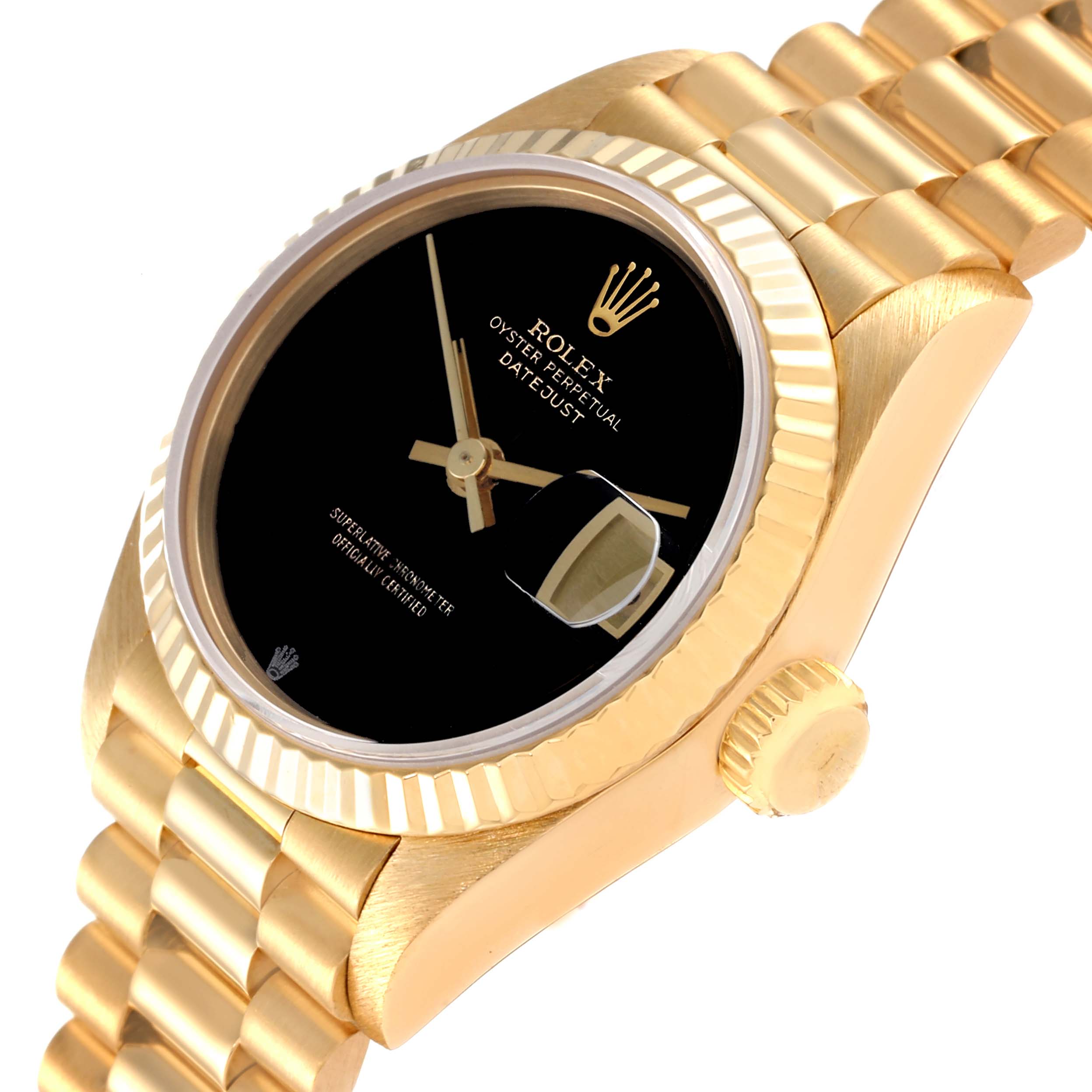 The image shows a close-up view of the Rolex President 69178 Women's Yellow Gold Black Dial 69178 Women's Yellow Gold Black Dial model, highlighting the black dial, fluted bezel, crown, and part of the gold bracelet.