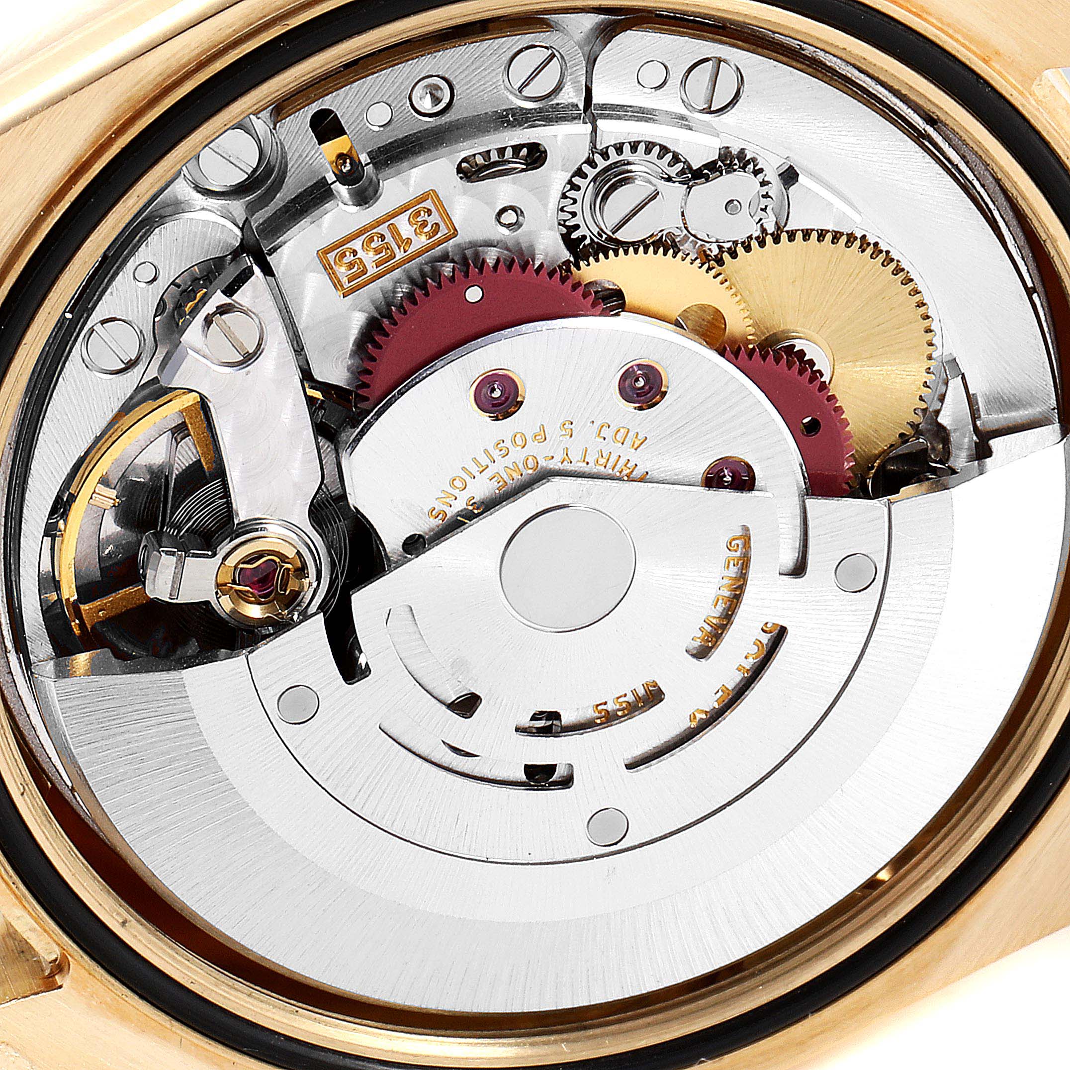 This image shows the intricate inner mechanism of a Rolex President 118238 Men's Yellow Gold Champagne Dial 118238 Men's Yellow Gold Champagne Dial watch, emphasizing gears and components from a top-down angle.