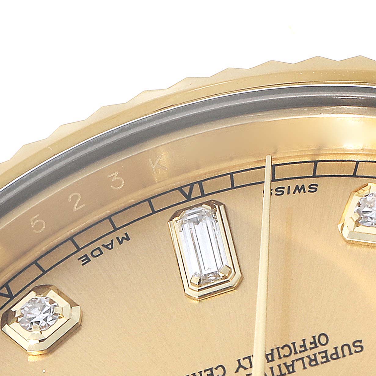 The image shows a close-up of the Rolex President 218238 Men's Yellow Gold Champagne Dial model watch dial, highlighting the bezel, diamond markers, and minute hand.