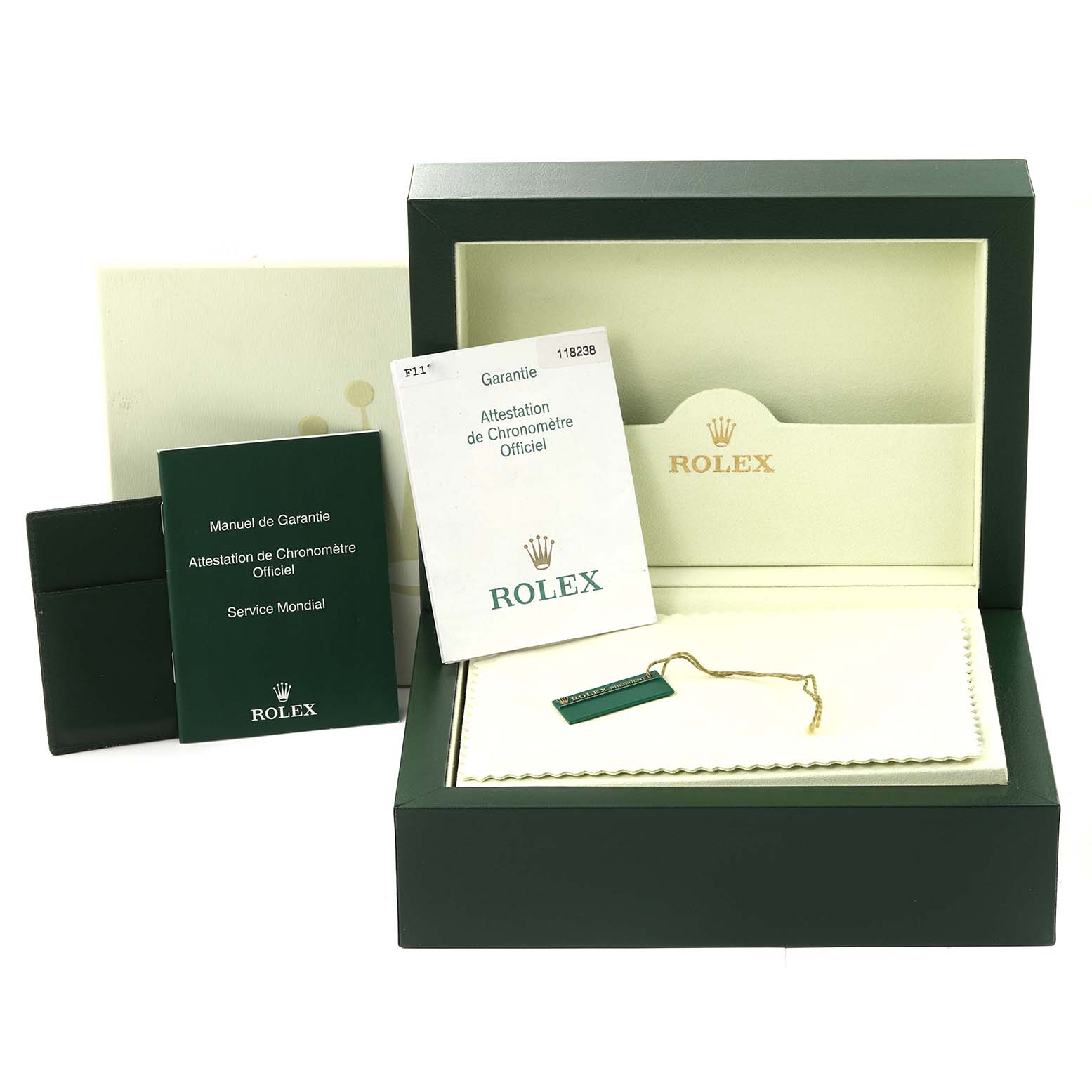 This image shows the packaging, warranty cards, and manuals for a Rolex President 118238 Men's Yellow Gold Champagne Dial 118238 Men's Yellow Gold Champagne Dial model watch.