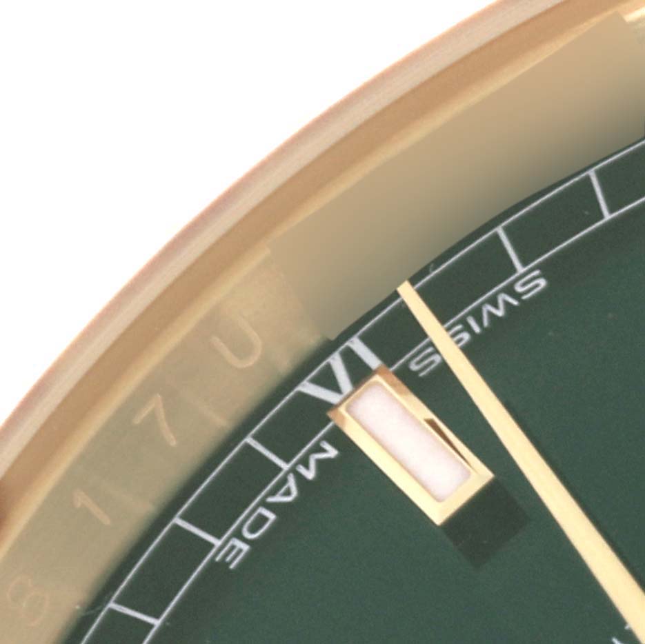 The close-up image shows part of the dial, indices, minute hand, and "Swiss Made" text on a Rolex President 118138 Men
s Yellow Gold Green Dial 118138 Men
s Yellow Gold Green Dial model watch.