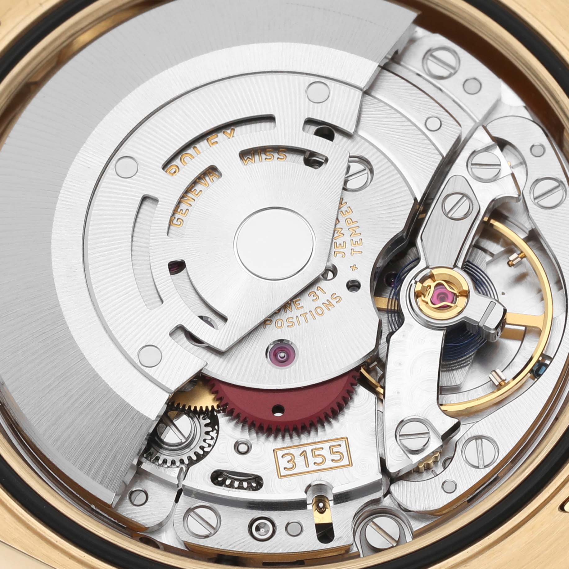 This image shows the intricate inner movement and mechanism of the Rolex President 118138 Men
s Yellow Gold Green Dial 118138 Men
s Yellow Gold Green Dial model watch.