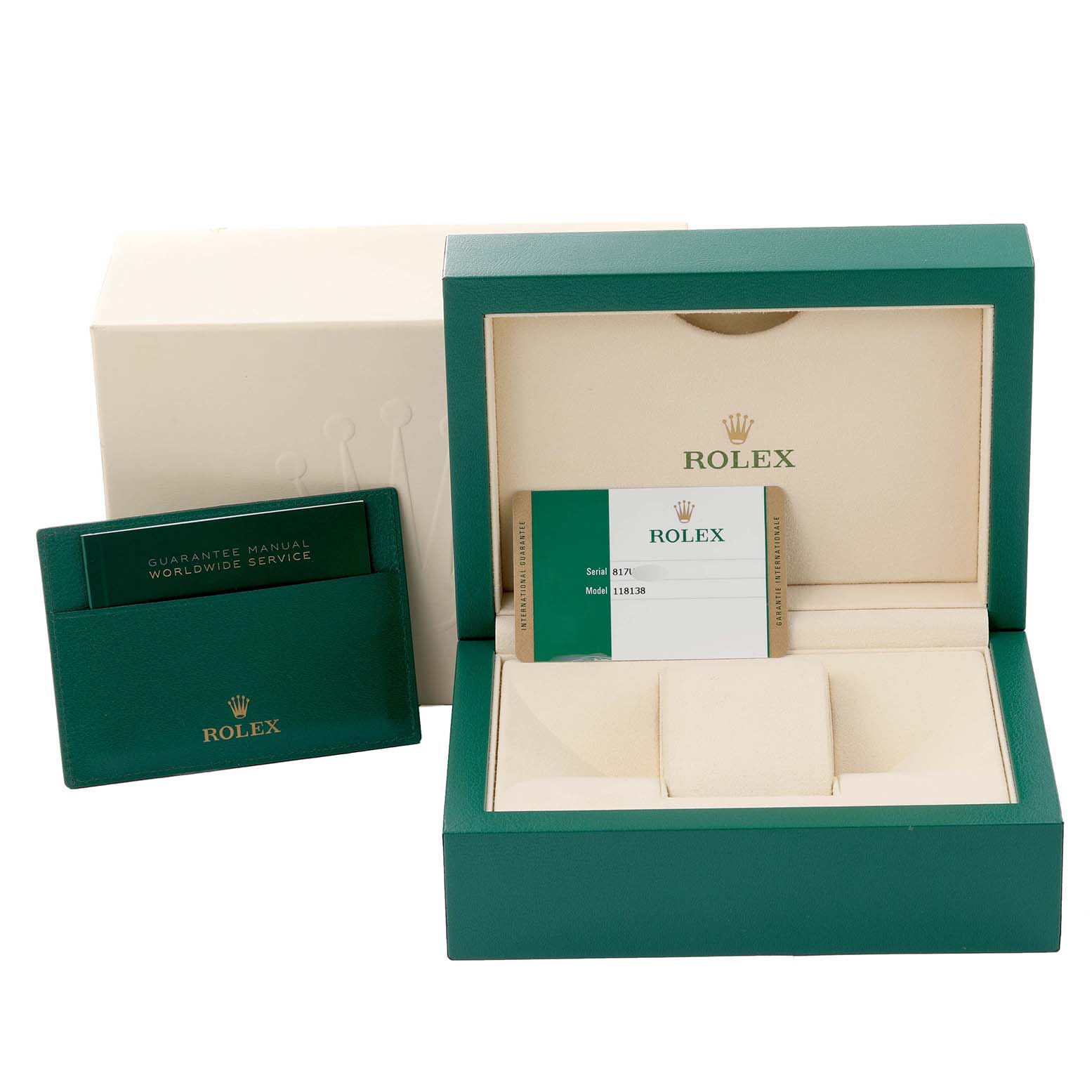 The image shows the packaging, including the box, guarantee manual, and warranty card for a Rolex President 118138 Men
s Yellow Gold Green Dial 118138 Men
s Yellow Gold Green Dial model watch.