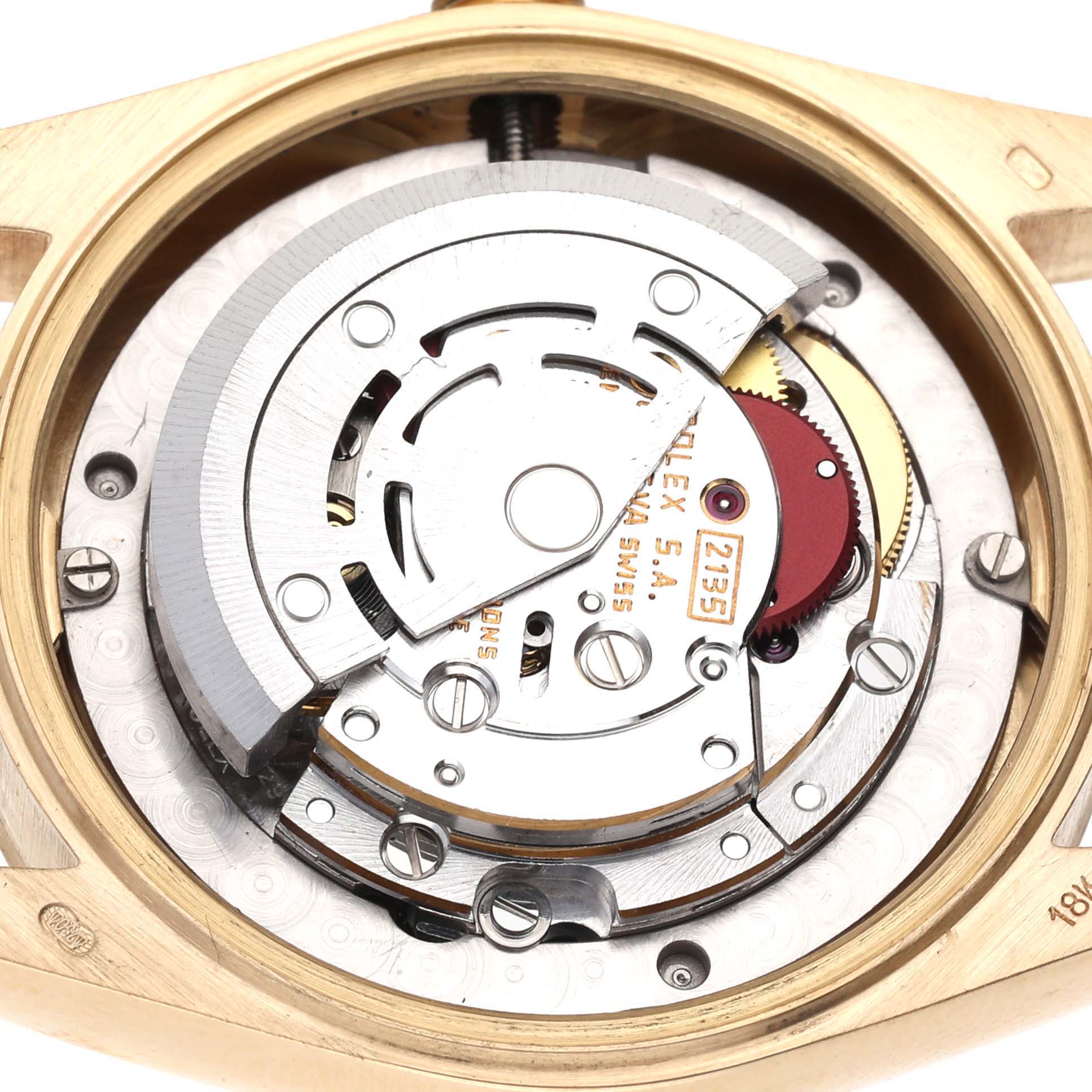 This image shows the intricate internal mechanism of a Rolex President 68278 Women's Yellow Gold Champagne Dial 68278 Women's Yellow Gold Champagne Dial model watch from a close-up, top-down angle.
