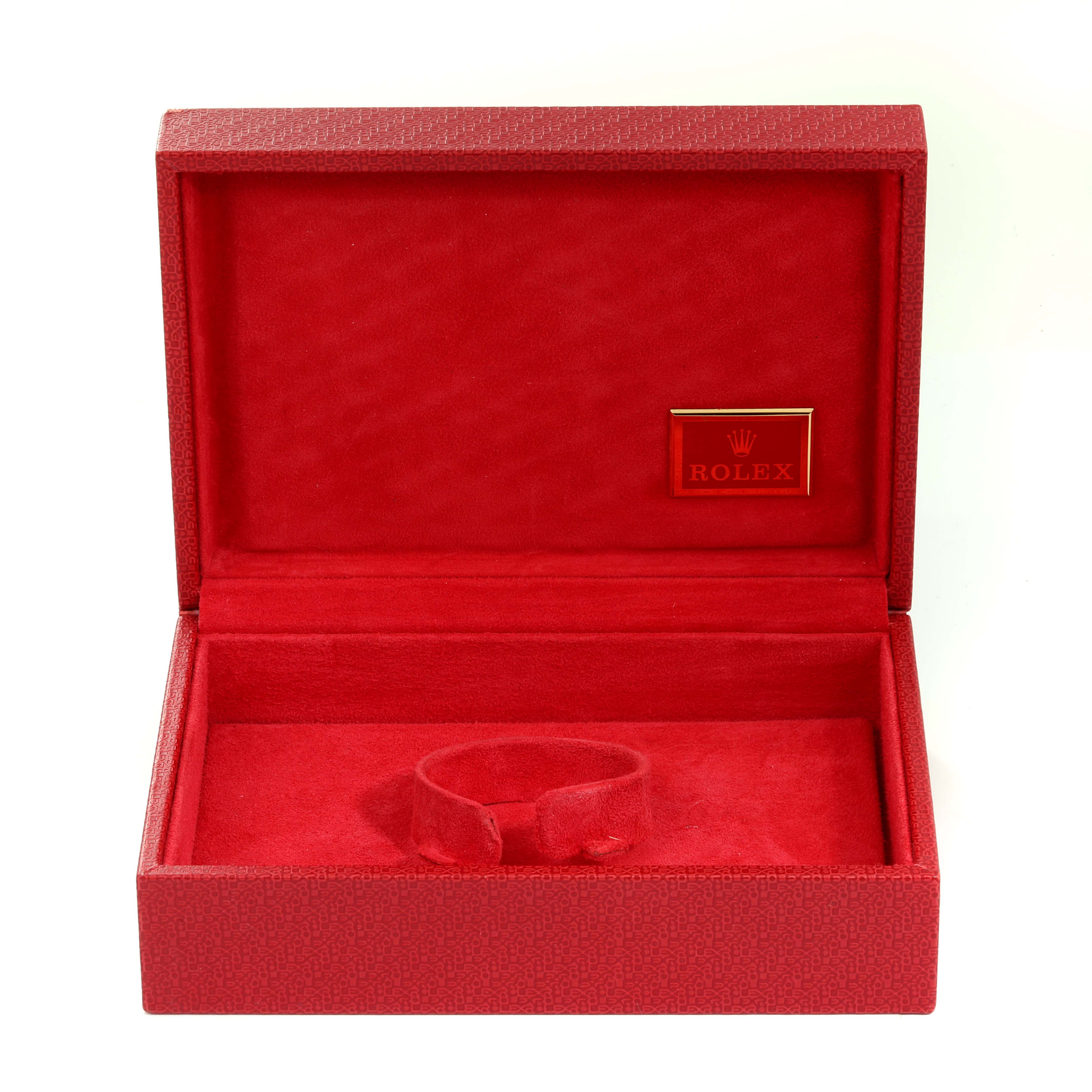 This image shows an open red Rolex box for the President model.