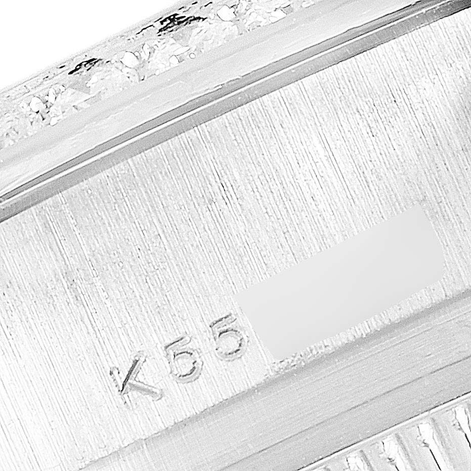 The image shows a close-up of the side view of the Rolex President 179136 Women's Platinum Silver Dial 179136 Women's Platinum Silver Dial model watch casing, highlighting the serial number.