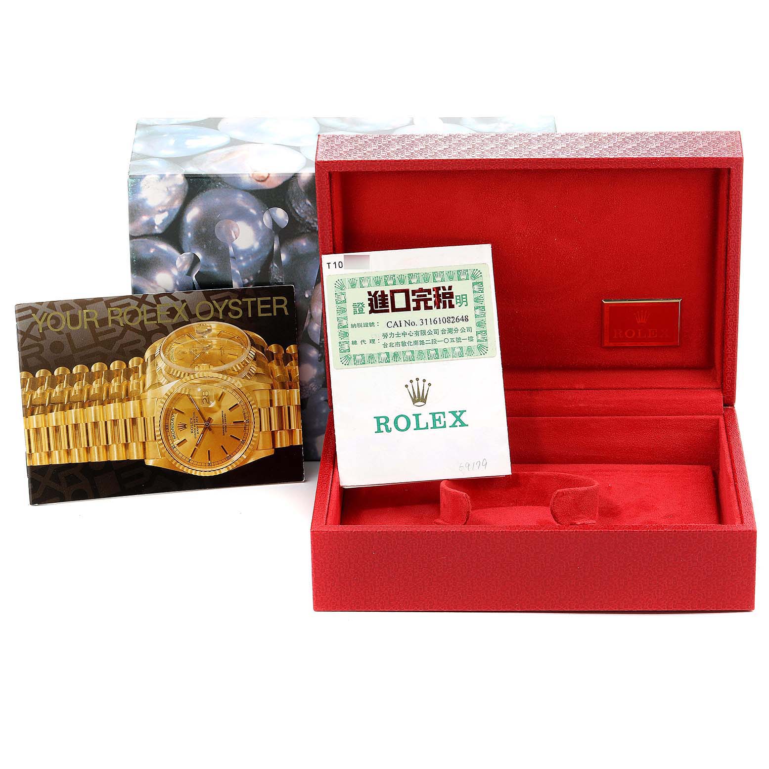 This image shows the packaging, warranty card, and booklet for a Rolex President 69179 Women's White Gold Silver Dial 69179 Women's White Gold Silver Dial model watch.