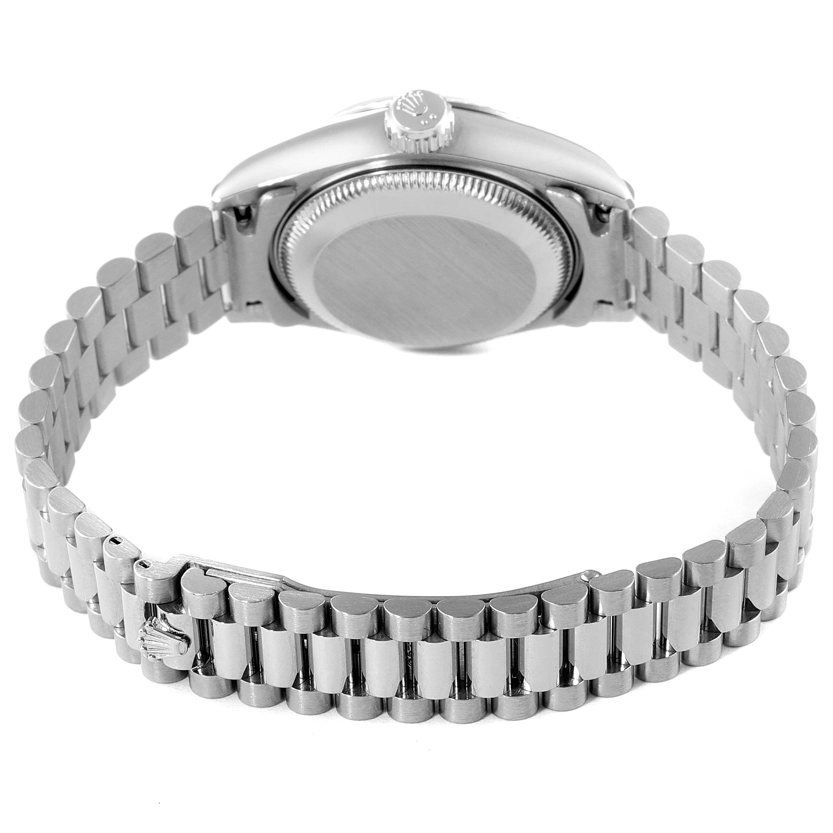 The image shows the back view of the Rolex President 69179 Women's White Gold Silver Dial 69179 Women's White Gold Silver Dial model watch, highlighting its case back, crown, and bracelet.
