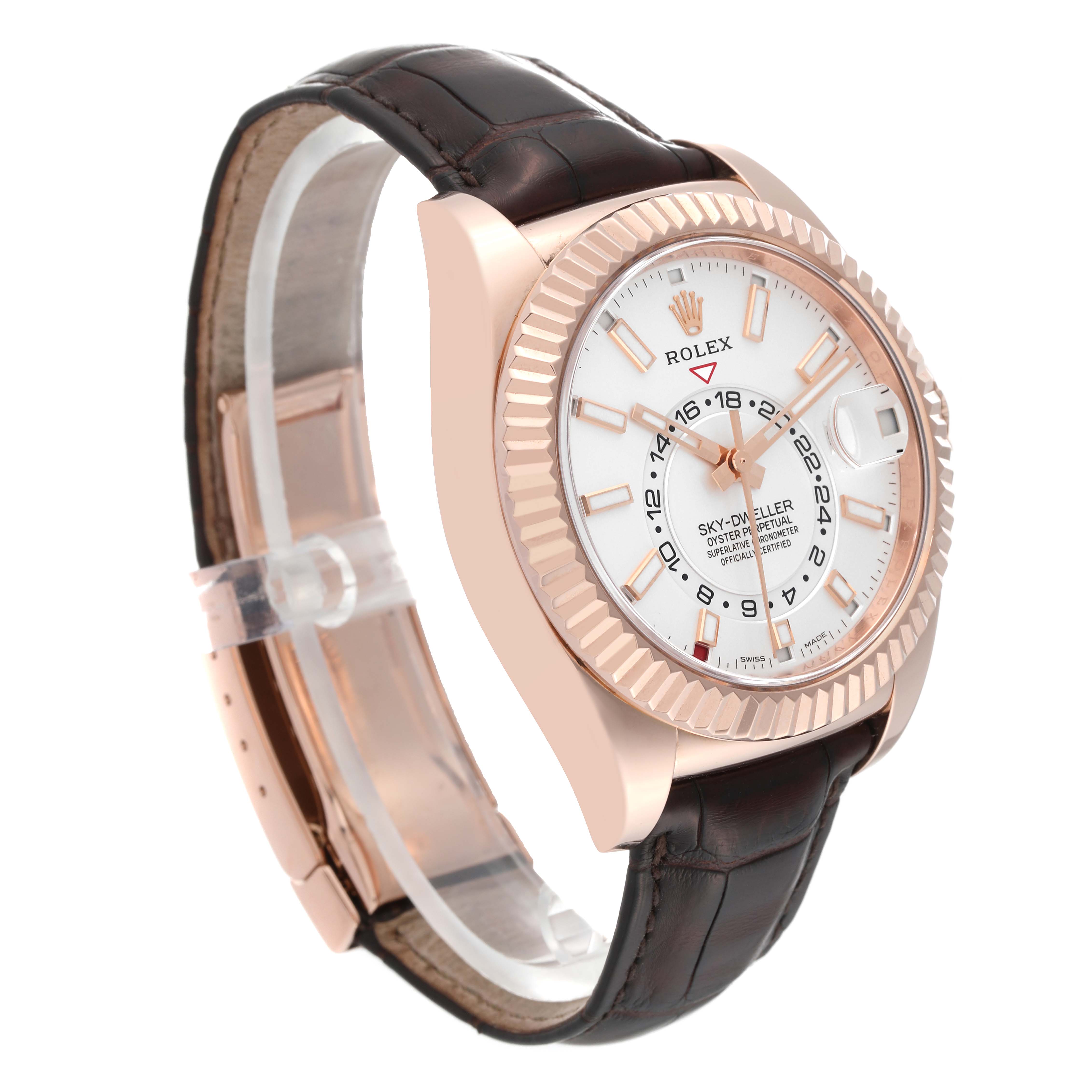 The Rolex Sky-Dweller 326135 Men's Rose Gold Silver Dial watch is shown in a side angle, displaying the face, fluted bezel, strap, and clasp.