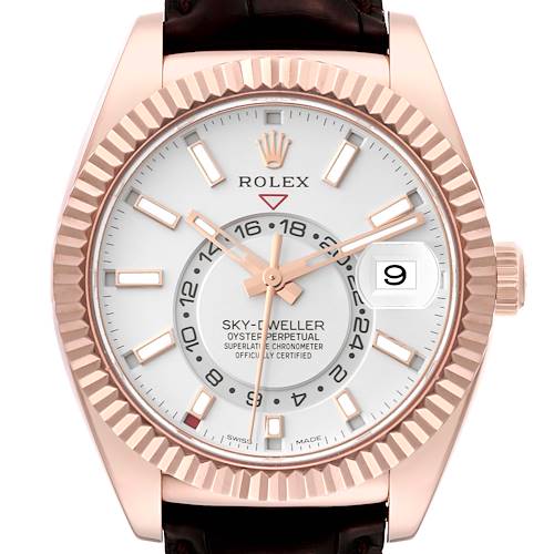 The Rolex Sky-Dweller 326135 Mens Rose Gold Silver Dial watch is shown from a front angle, featuring the dial, bezel, and part of the crown.