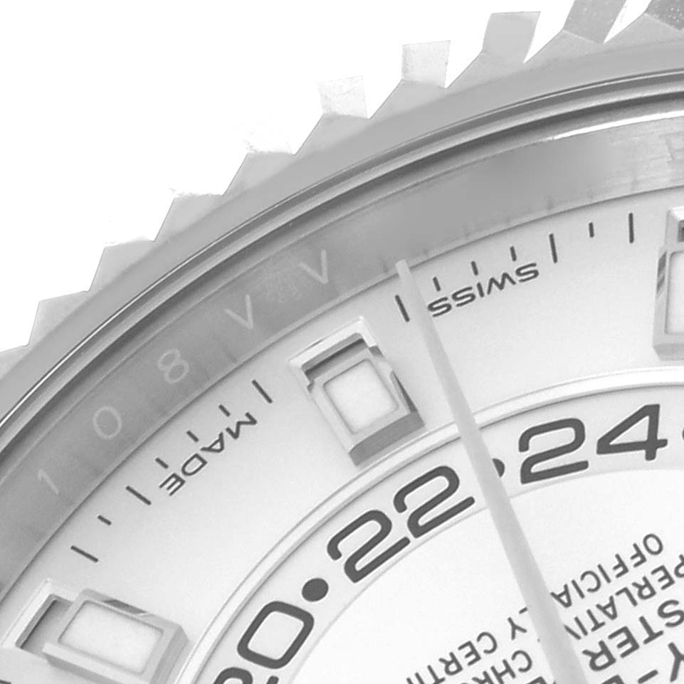 This close-up angle shows the dial, markers, and edge of the bezel of a Rolex Sky-Dweller 326934 Men
s Stainless Steel White Dial 326934 Men
s Stainless Steel White Dial watch.