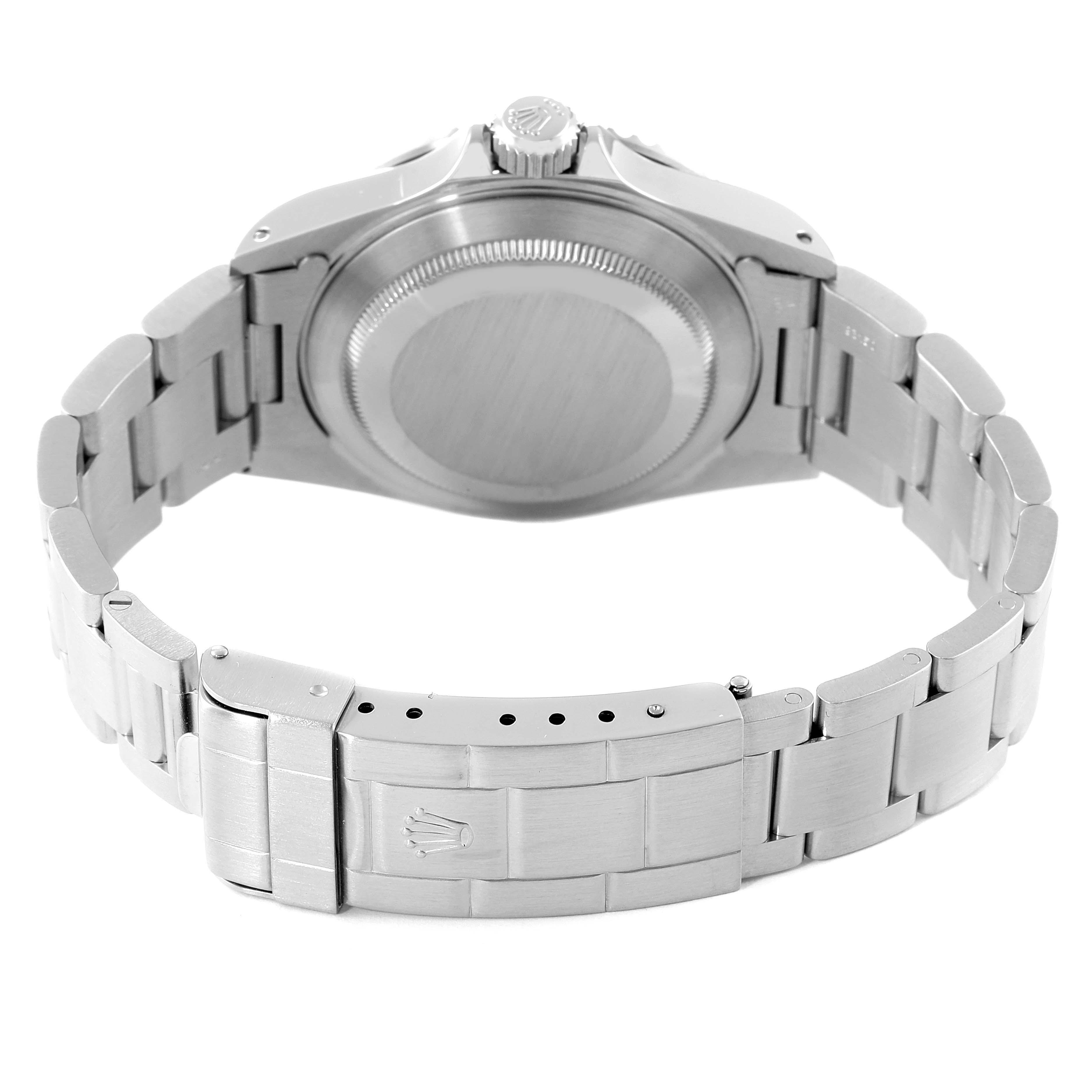 The image shows the back side of a Rolex Submariner 14060M Men's Stainless Steel Black Dial 14060M Men's Stainless Steel Black Dial model, highlighting its closed clasp, bracelet, and case back.