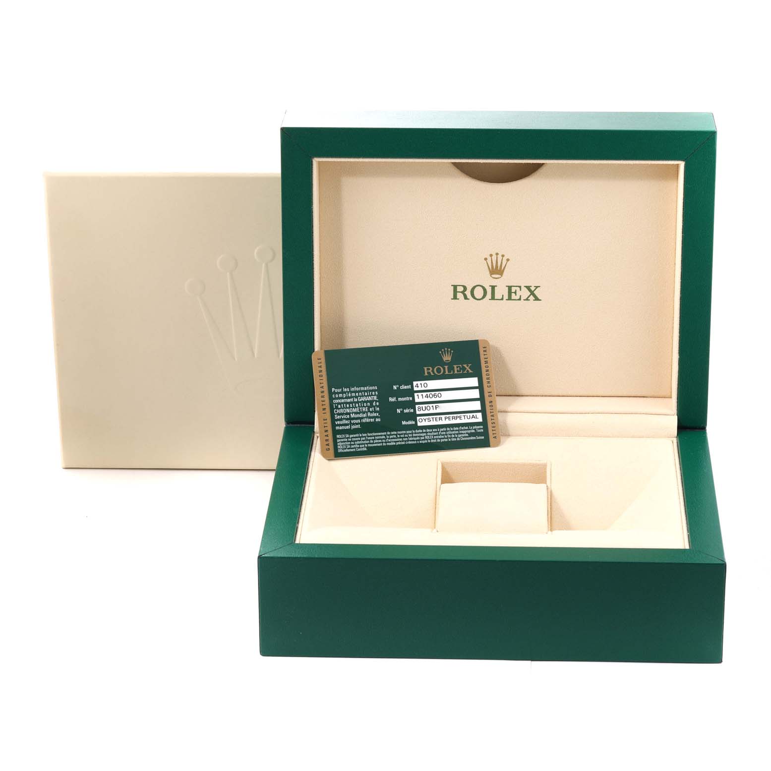 The image shows an open Rolex Submariner 114060 Men
s Stainless Steel Black Dial 114060 Men
s Stainless Steel Black Dial box with the warranty card placed inside.