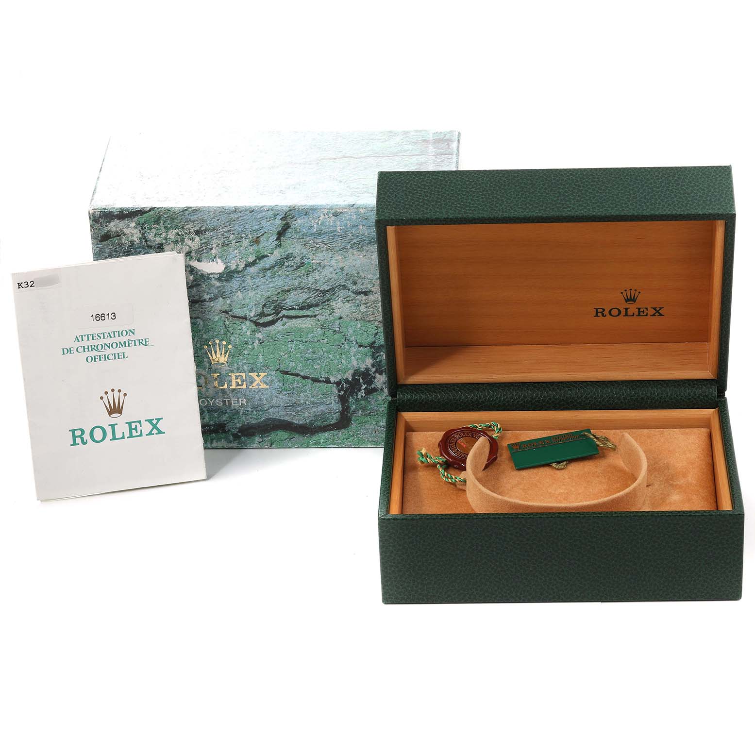 The image shows the open box and paperwork for a Rolex Submariner 16613 Men's Steel and Gold (two tone) Blue Dial 16613 Men's Steel and Gold (two tone) Blue Dial watch.