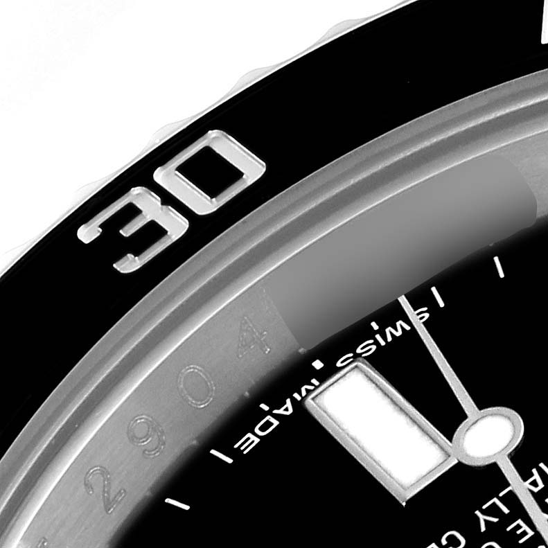 The image shows a close-up of the bezel and part of the dial of a Rolex Submariner 116610 Men's Stainless Steel Black Dial 116610 Men's Stainless Steel Black Dial watch.