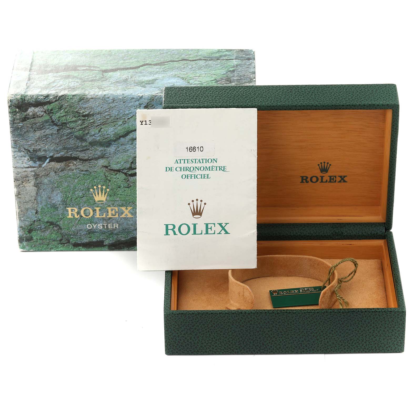 The image shows the packaging, documentation, and empty display box for a Rolex Submariner 16610 Men
s Stainless Steel Black Dial 16610 Men
s Stainless Steel Black Dial watch, including the outer box, inner box, and certificate.
