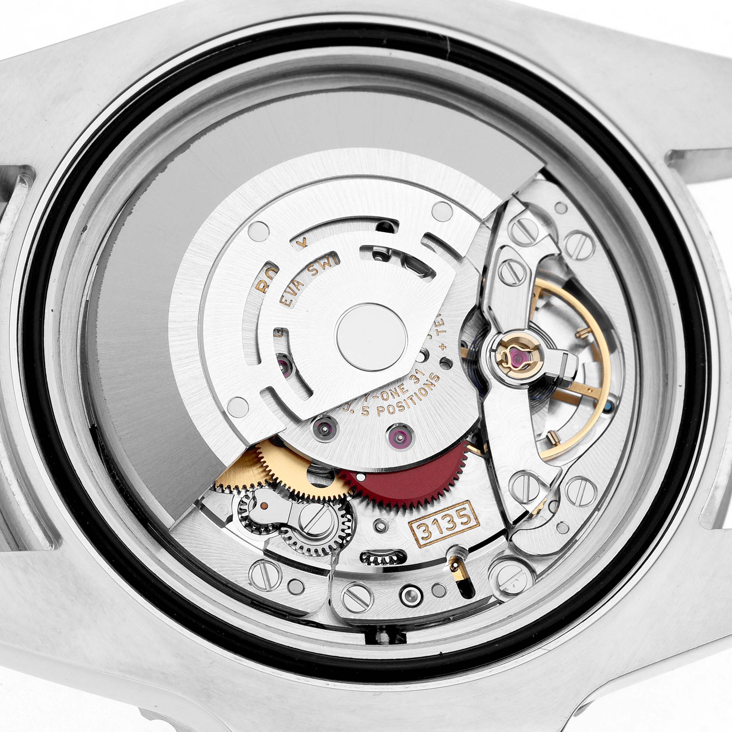 The image shows the back view of a Rolex Submariner 116610 Men's Stainless Steel Black Dial, revealing its intricate movement and internal mechanics.