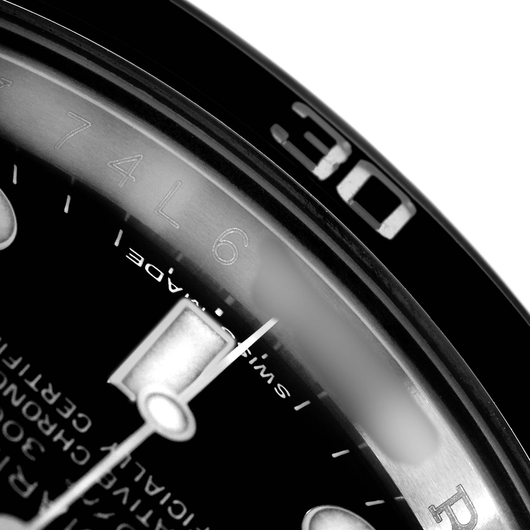 The close-up image shows a portion of the dial and bezel of a Rolex Submariner 116610 Men's Stainless Steel Black Dial, focusing on the hour markers and partial bezel numbers.