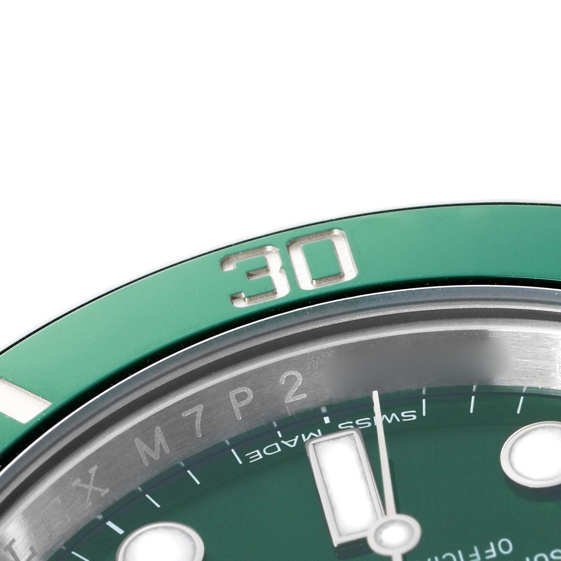 The image shows a close-up of the Rolex Submariner 116610 Men's Stainless Steel Green Dial's green bezel and part of the dial, highlighting the "30" marker.
