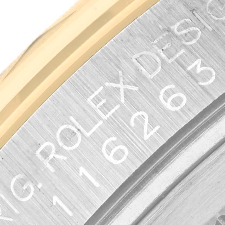 The image shows a close-up of the engraved model number and bezel edge of the Rolex Turn-o-Graph 116263 Men
s Steel and Gold (two tone) Grey Dial 116263 Men
s Steel and Gold (two tone) Grey Dial watch.