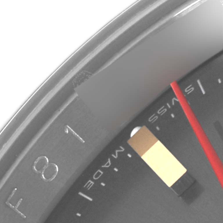 This image shows a close-up of the dial and bezel of a Rolex Turn-o-Graph 116263 Men
s Steel and Gold (two tone) Grey Dial 116263 Men
s Steel and Gold (two tone) Grey Dial, featuring the "Swiss Made" text and part of the second hand.